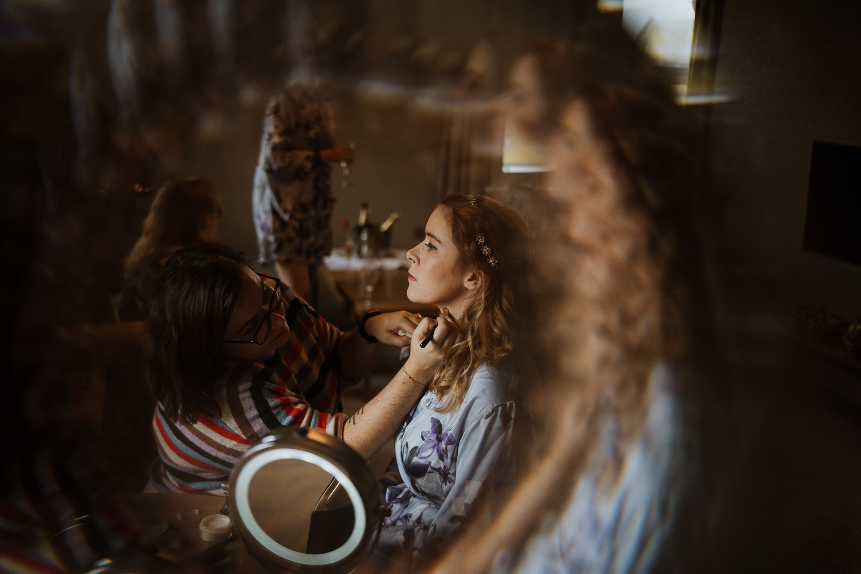 A person standing in front of a mirror posing for the camera