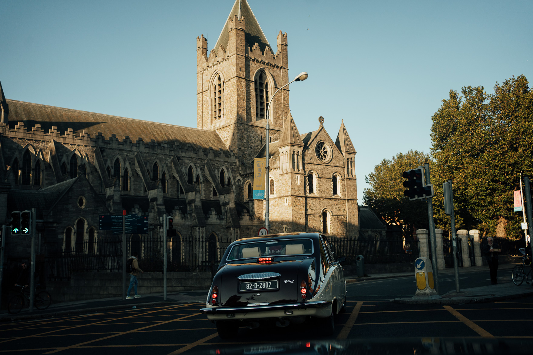 A car parked in front of a church