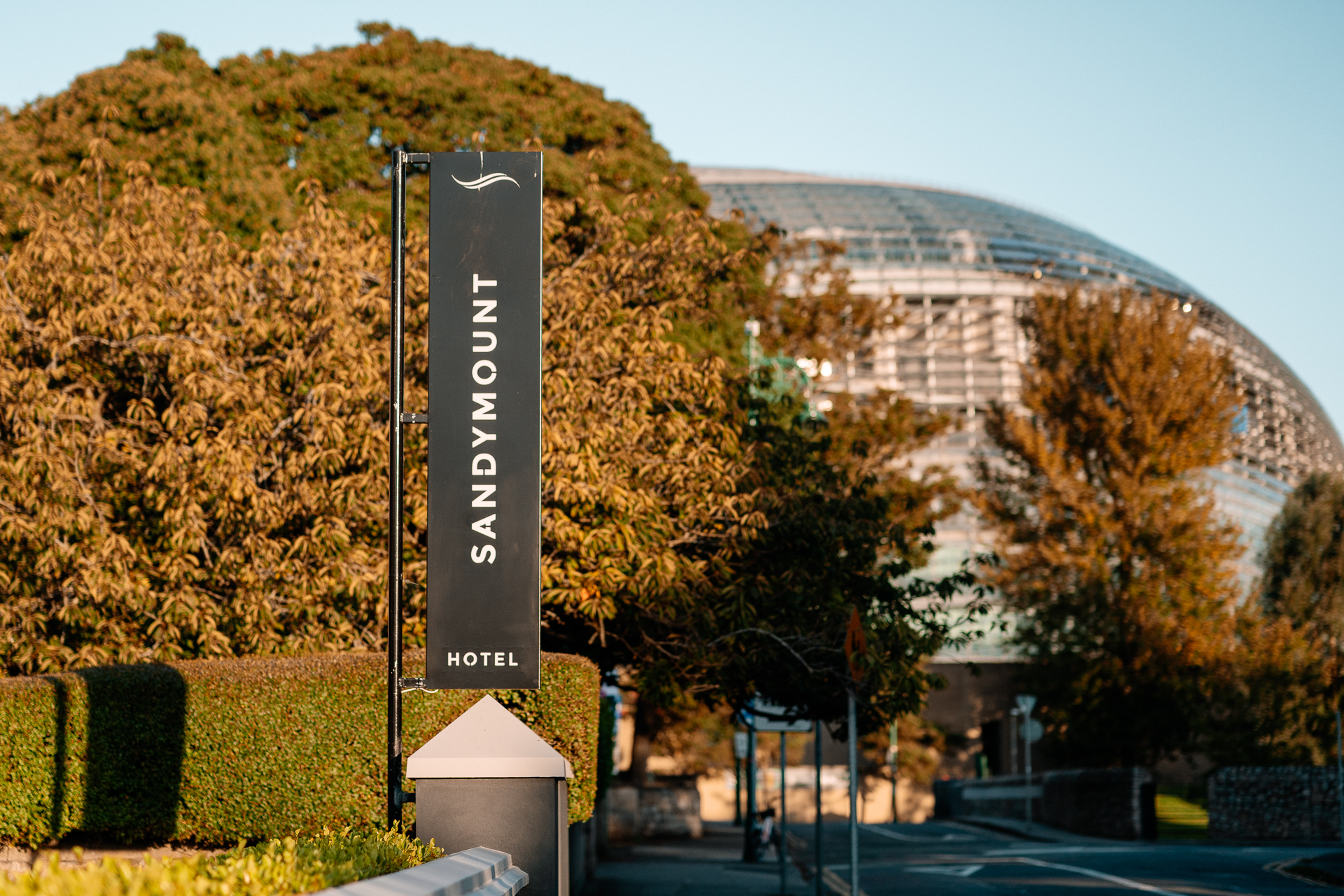 A sign in front of a building