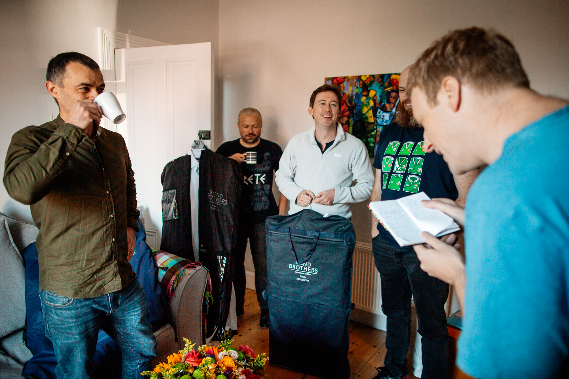 A group of men standing in a room