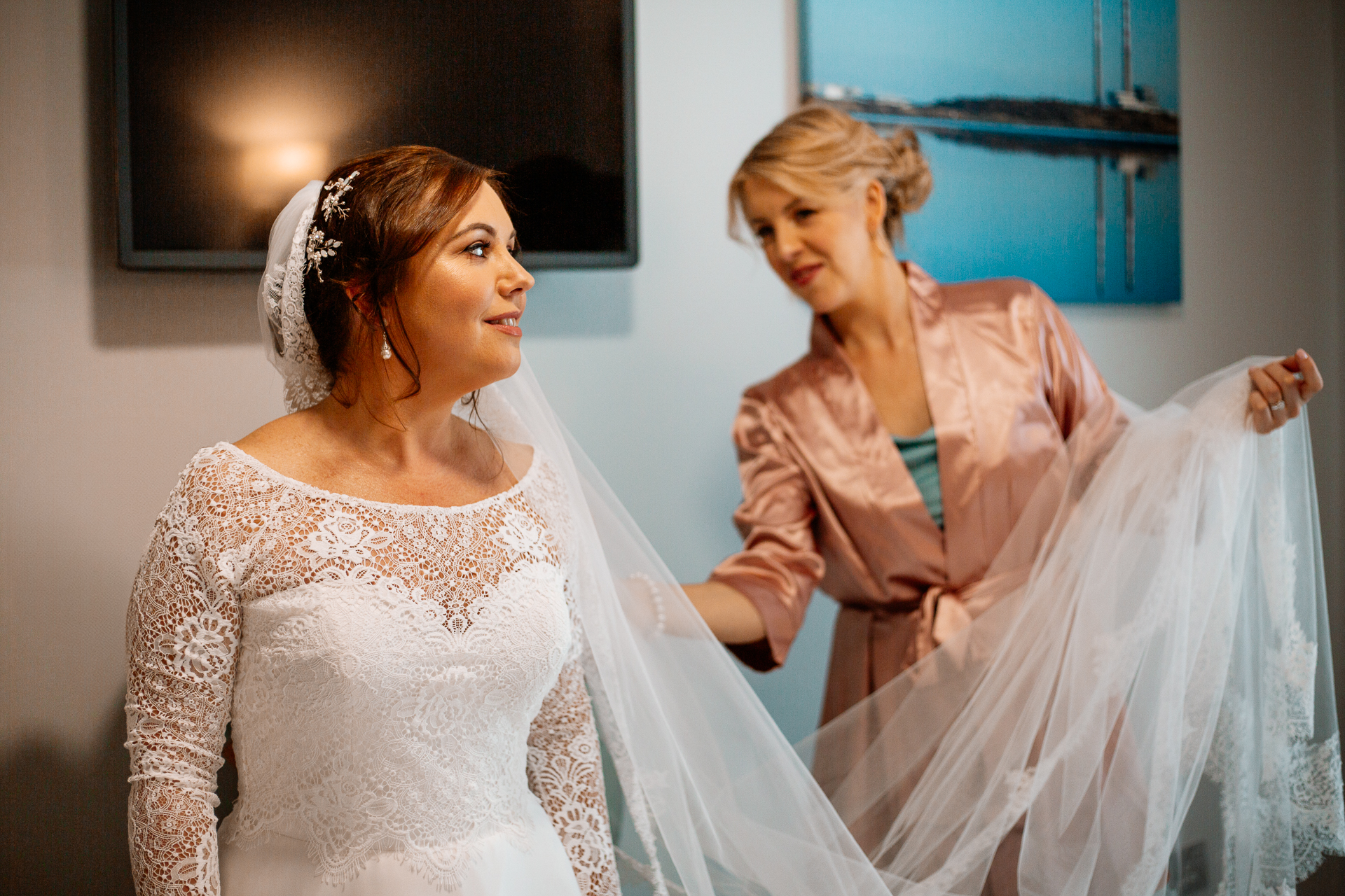 A person in a white dress and a person in a white dress