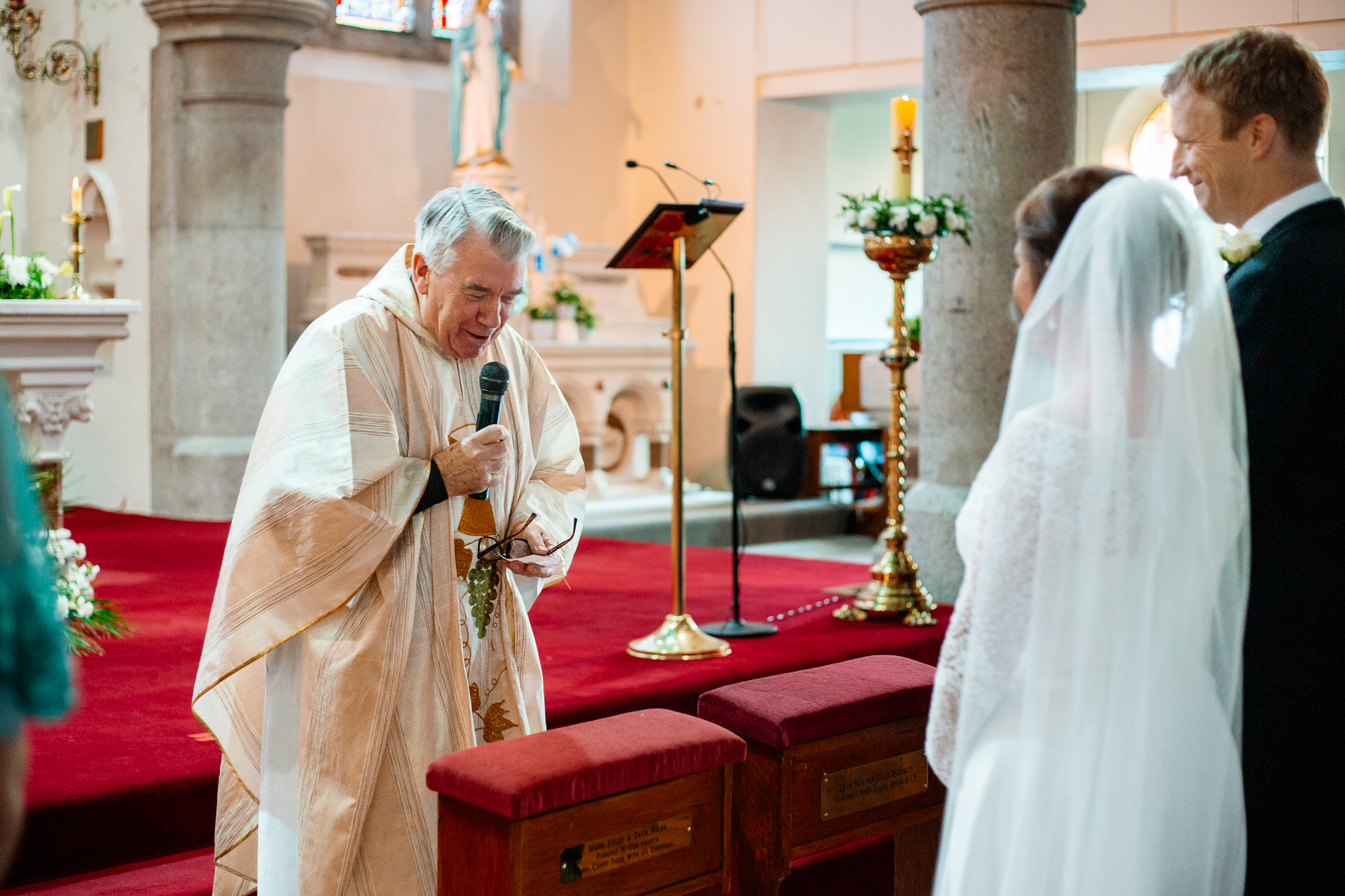 A man in a white robe and a woman in a white dress