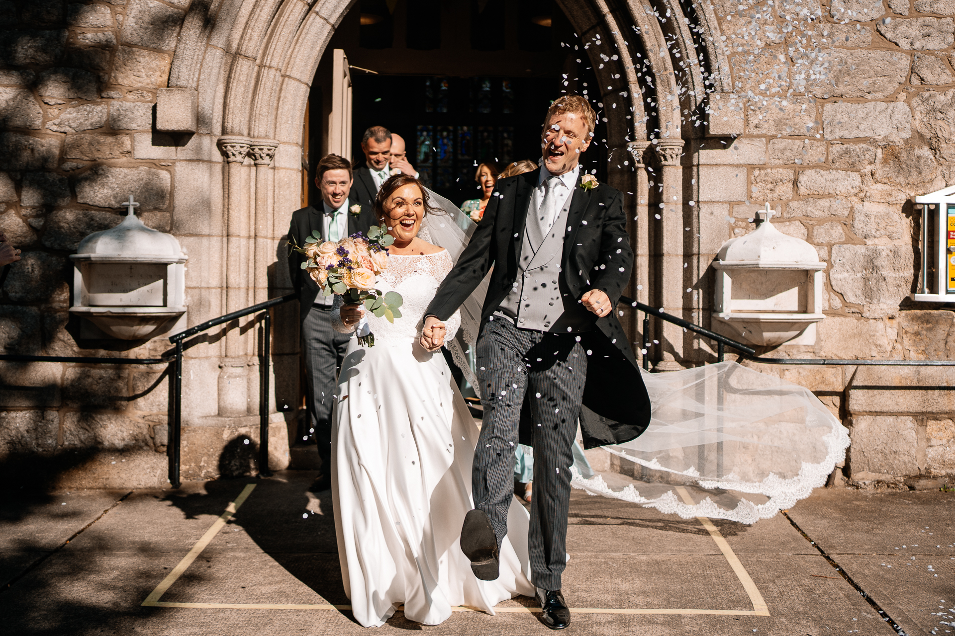 A man and woman in wedding attire