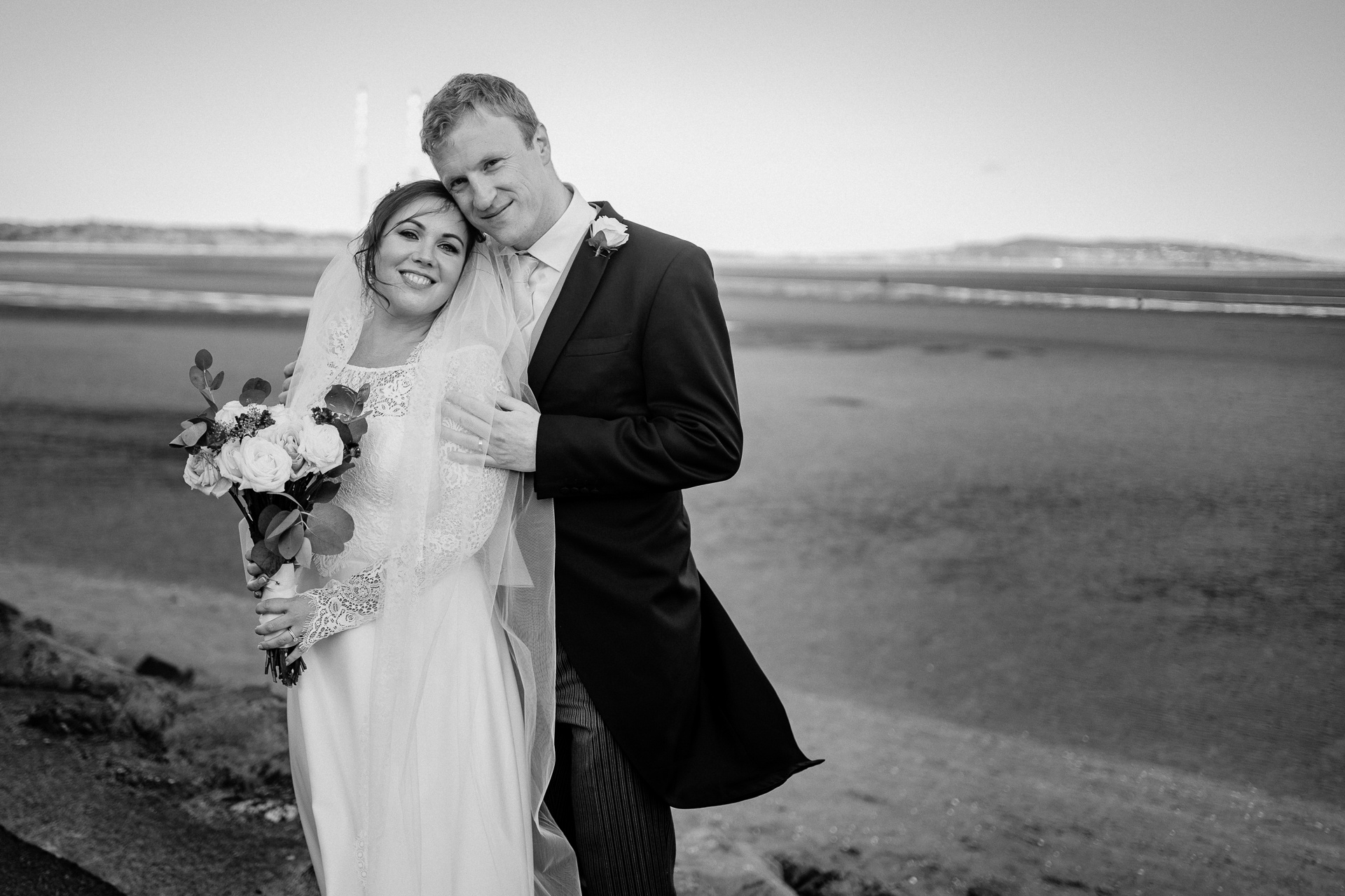 A man and woman posing for a picture