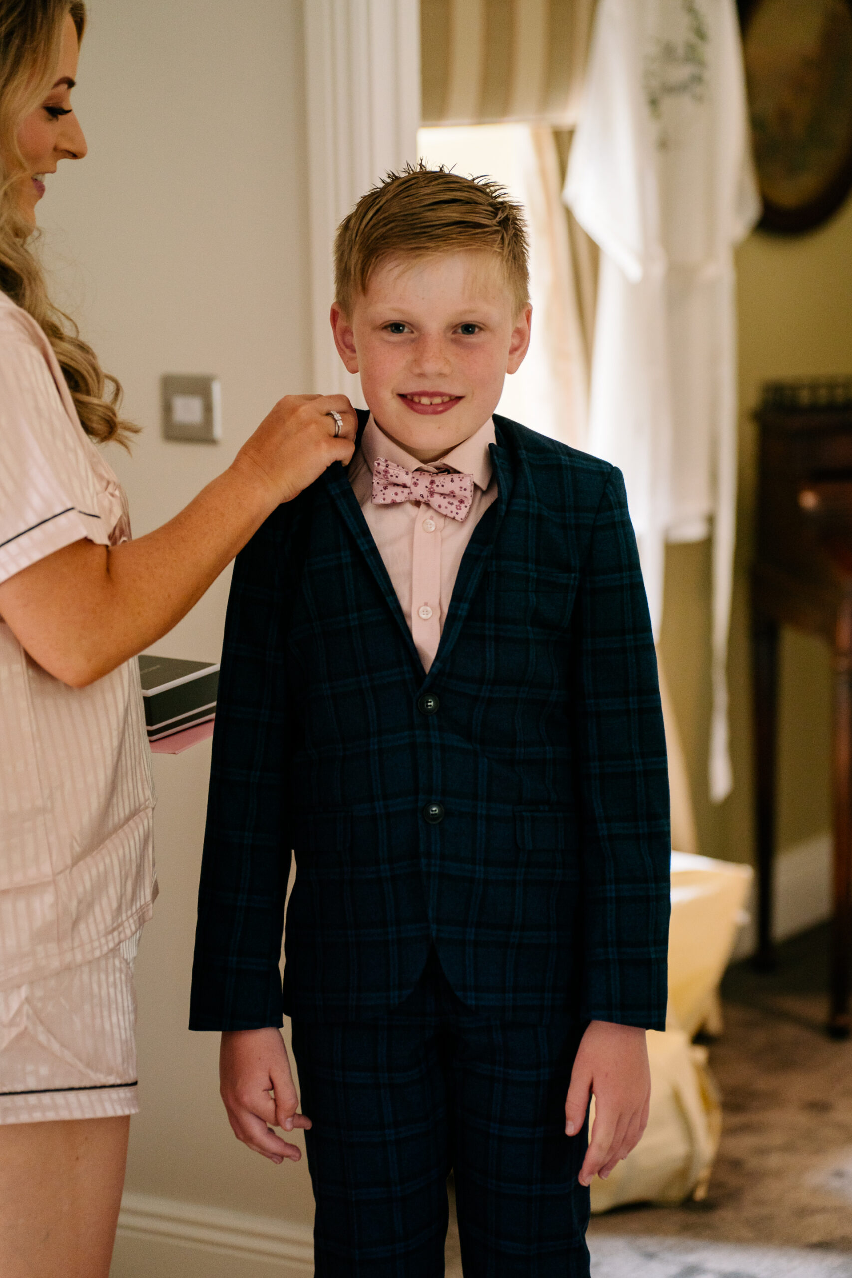 A boy in a bow tie