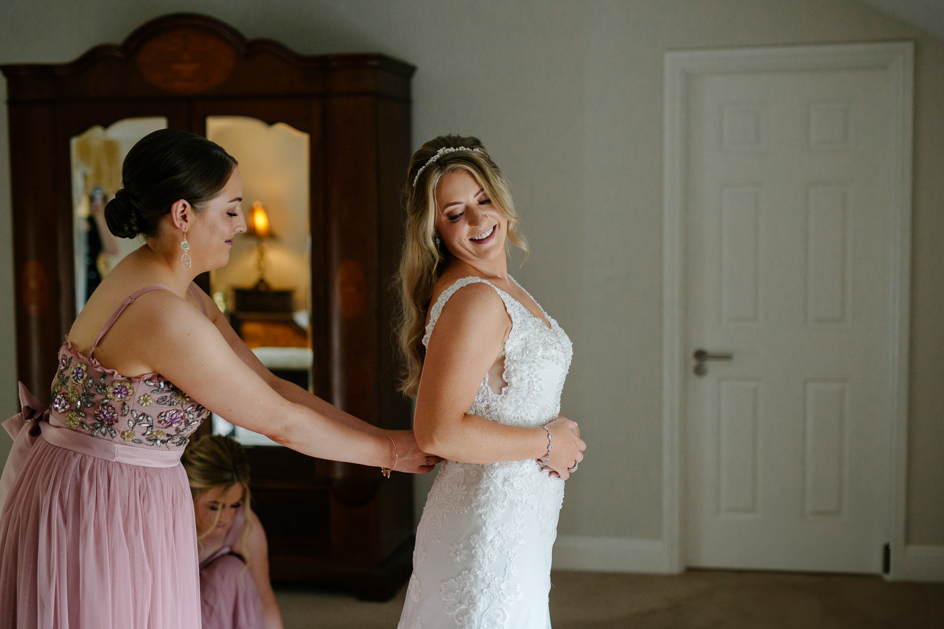 A woman in a white dress and a woman in a white dress