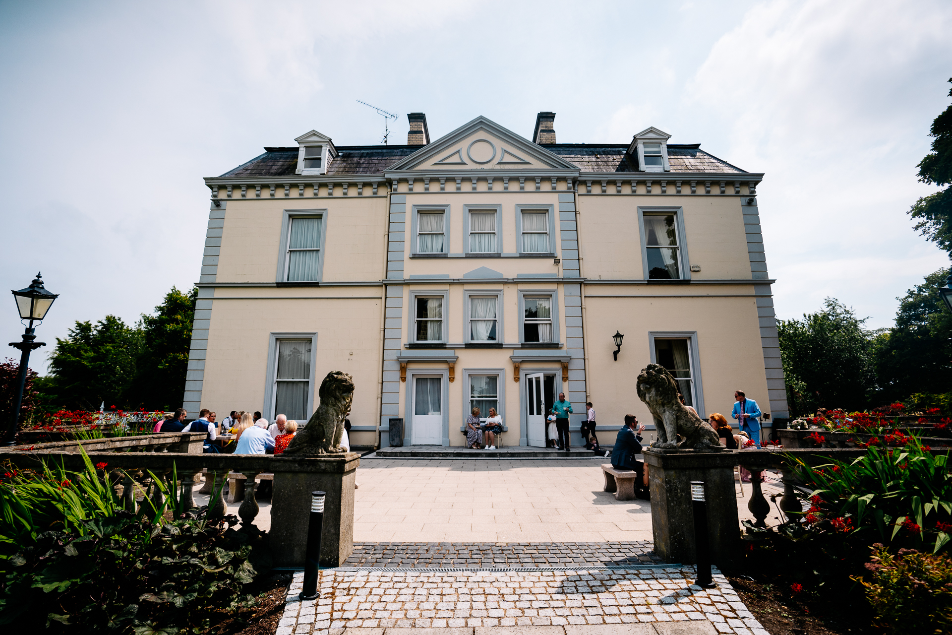 A building with a fountain in front