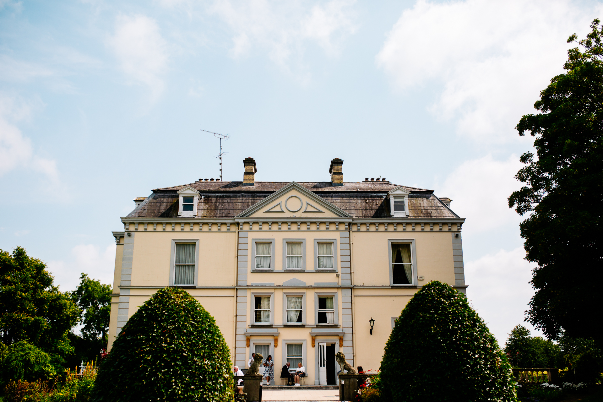 A building with trees in the front