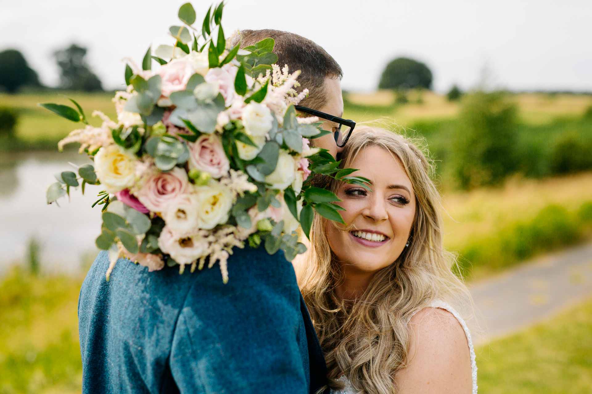 A person holding a bouquet of flowers