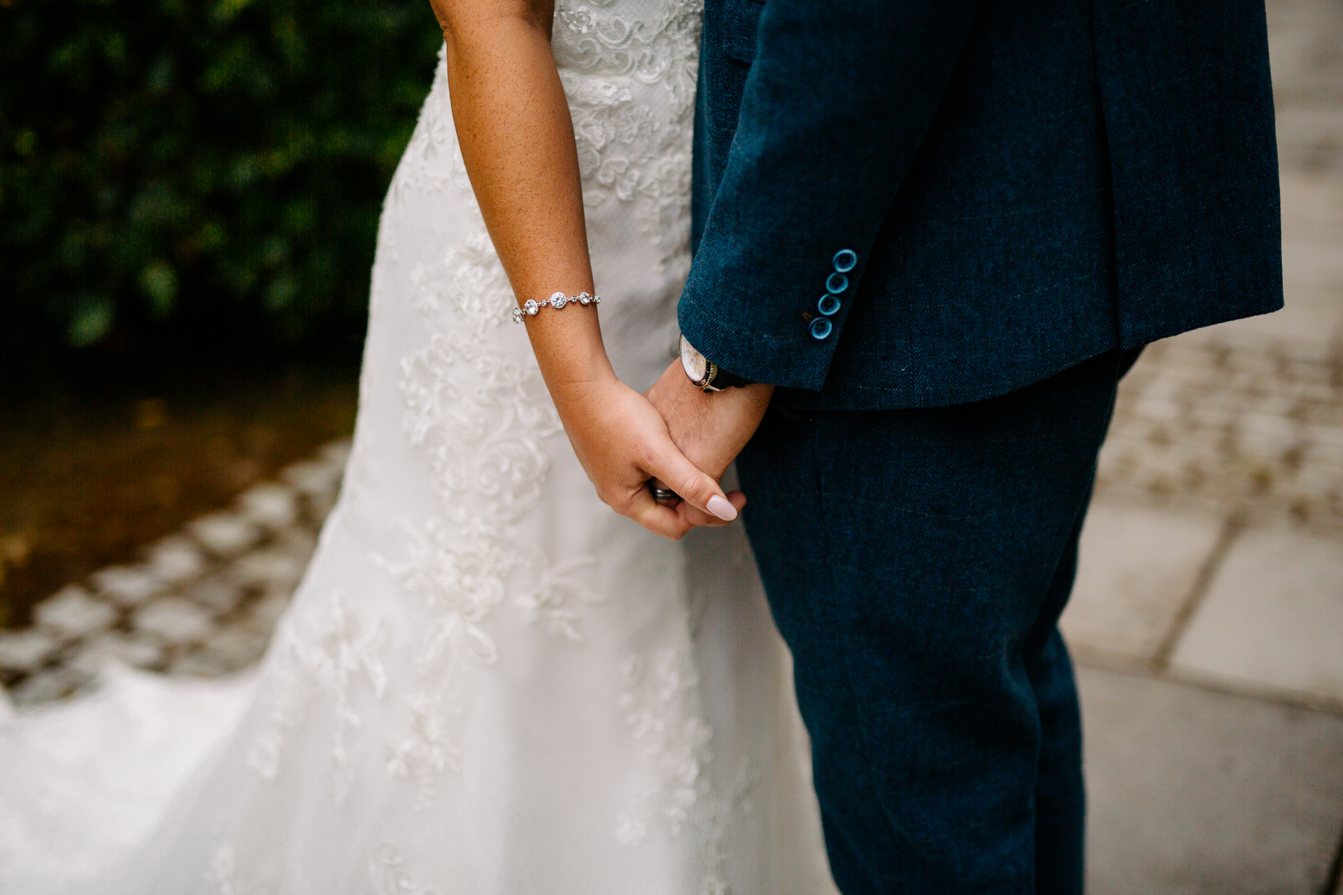 A man and woman holding hands