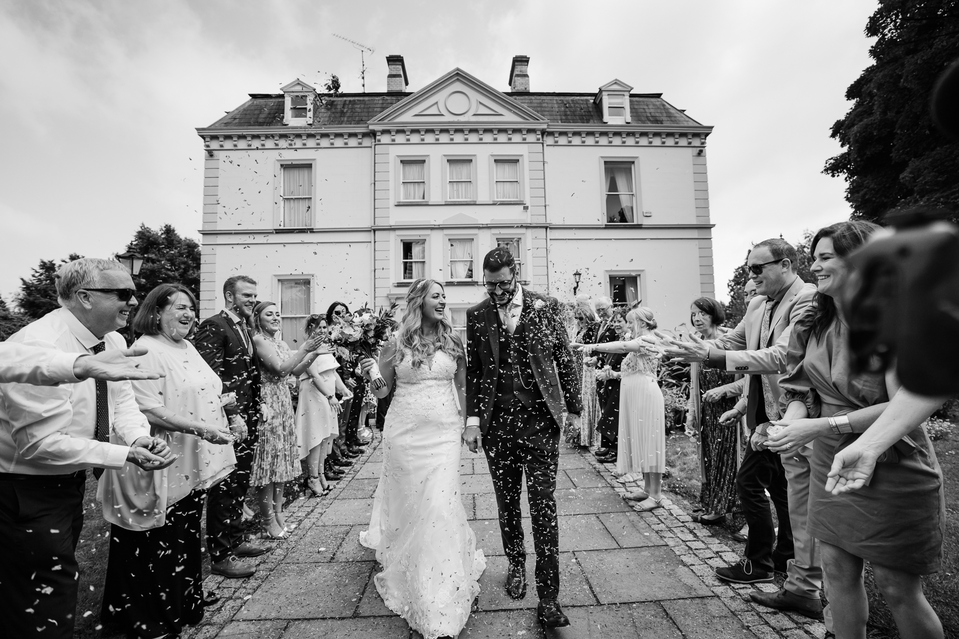 A group of people outside a house