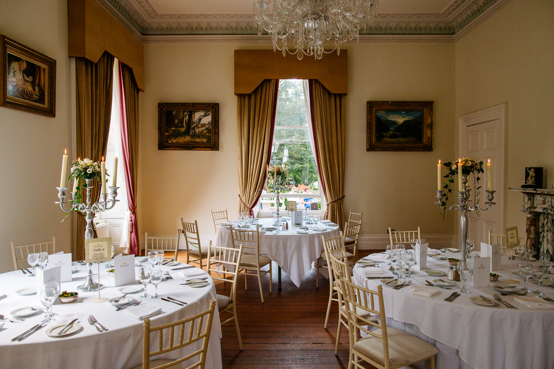 A room with tables and chairs