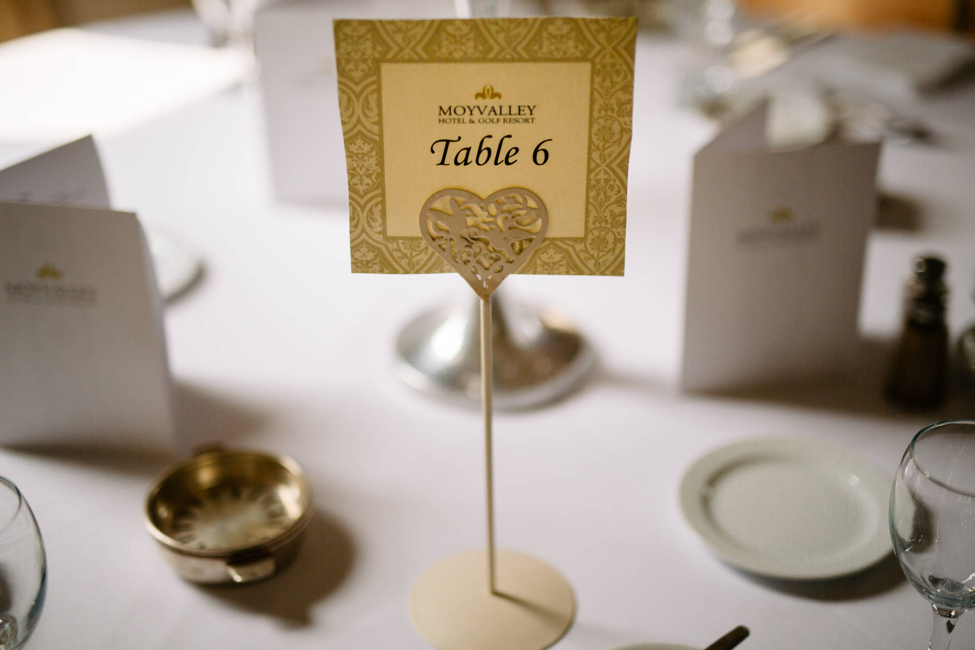 A gold award on a table