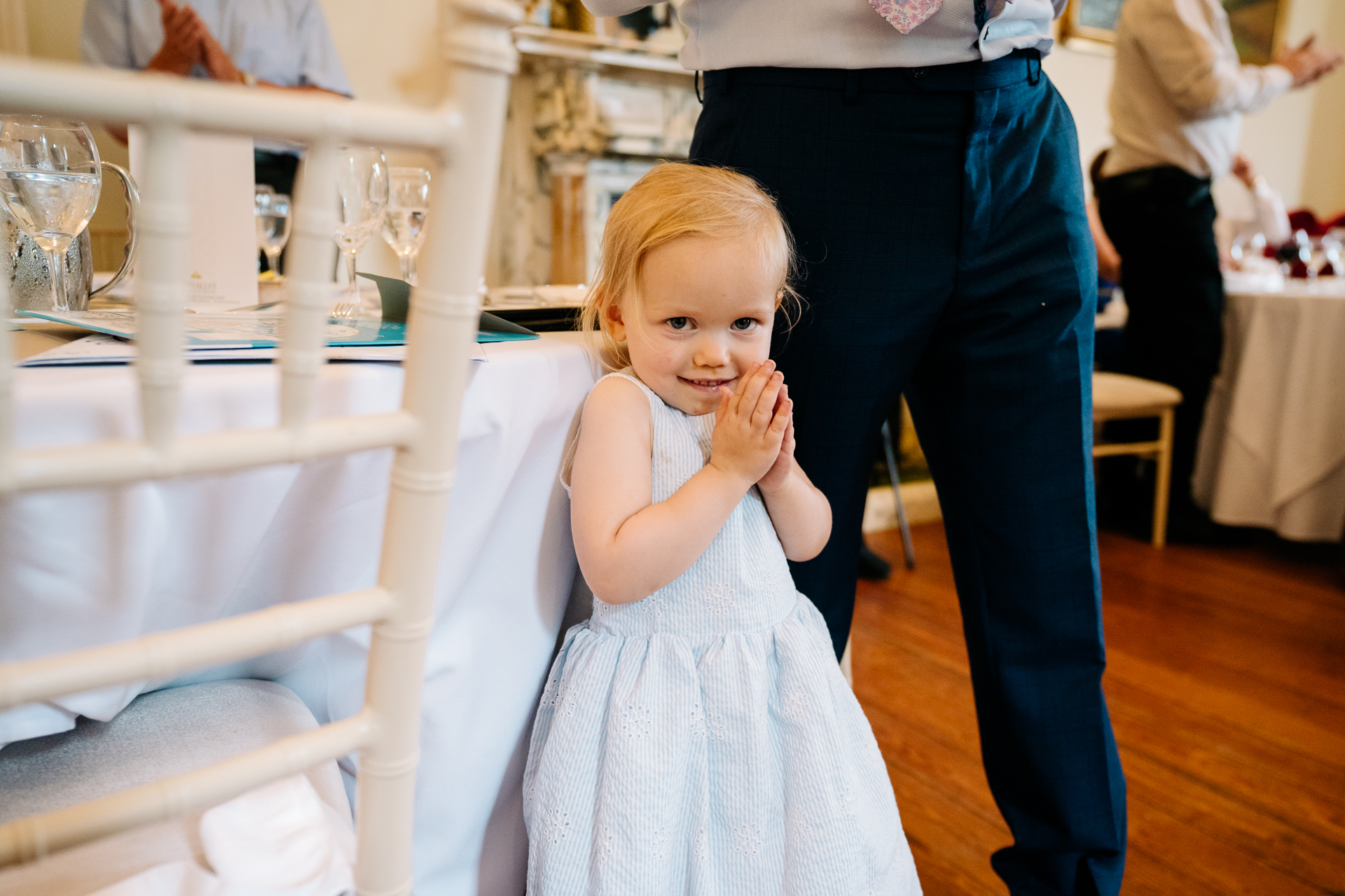 A little girl in a white dress