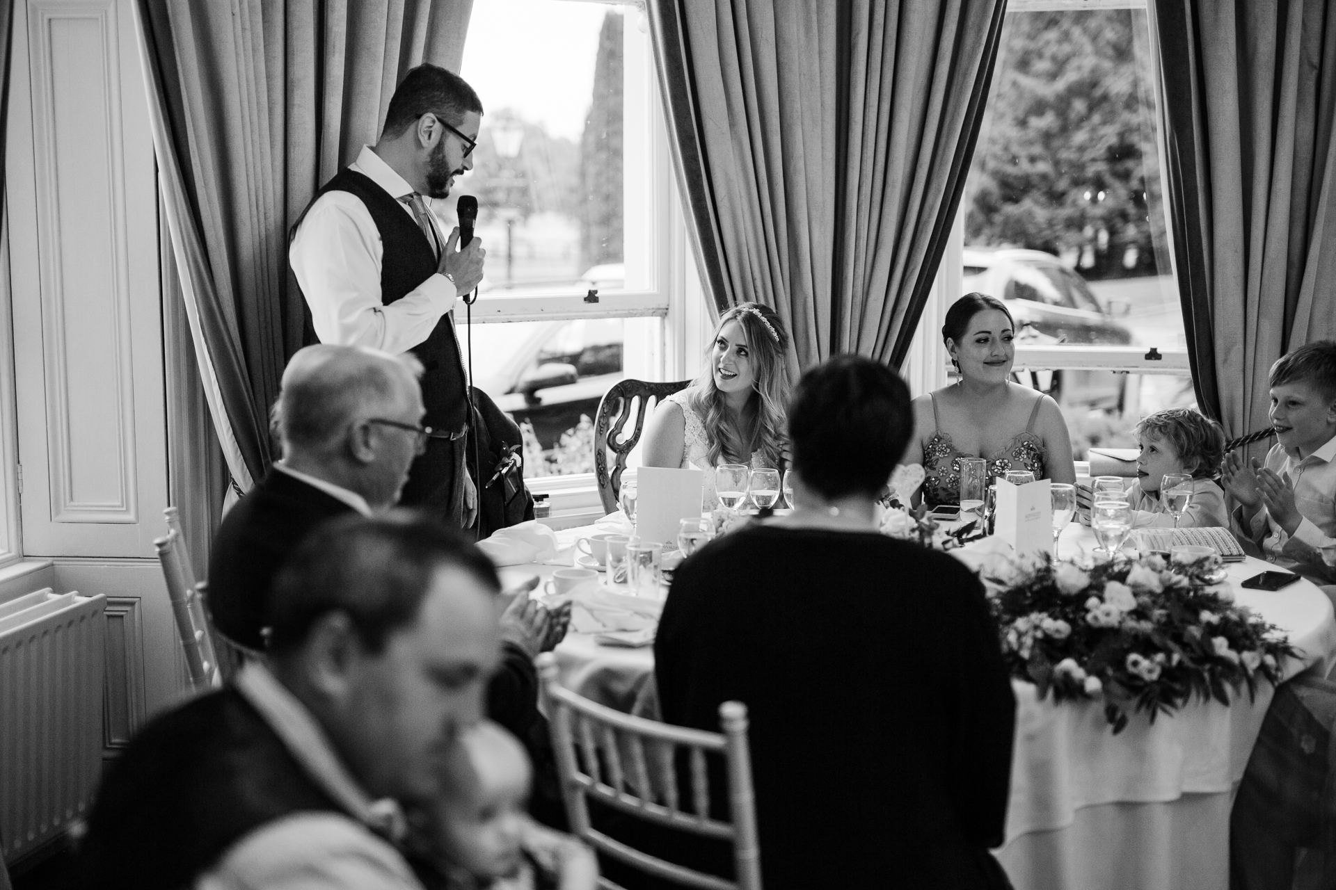 A group of people sitting around a table