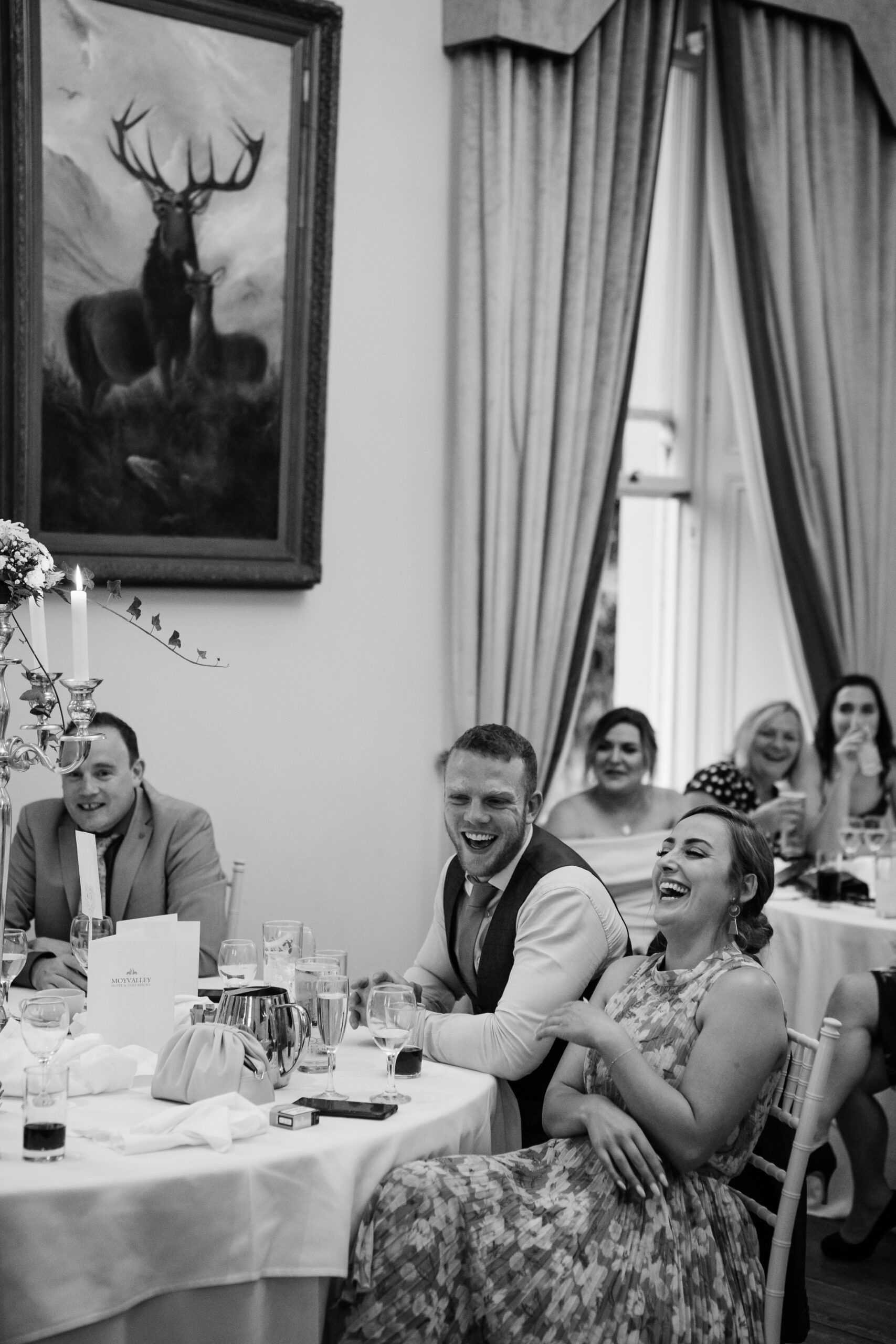 A group of people sitting at a table