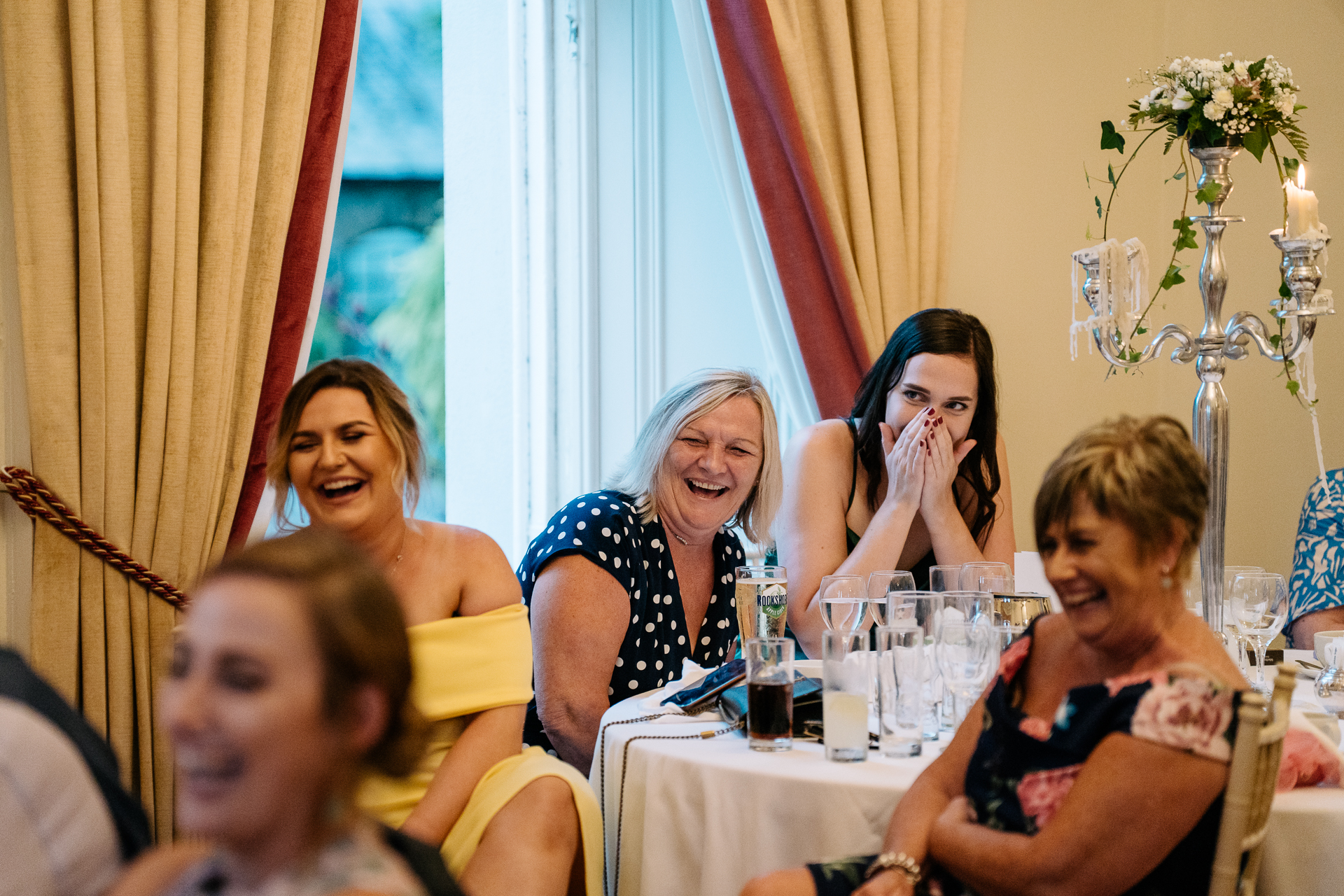 A group of women sitting around a table