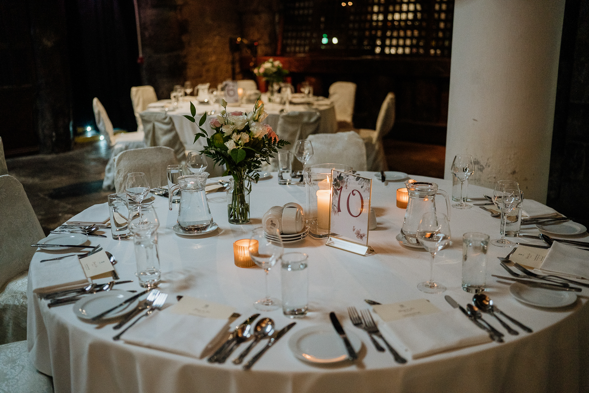 A table set with plates and glasses