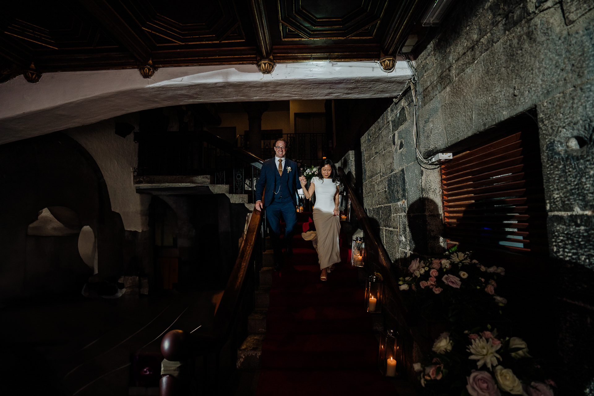 A man and woman on a staircase