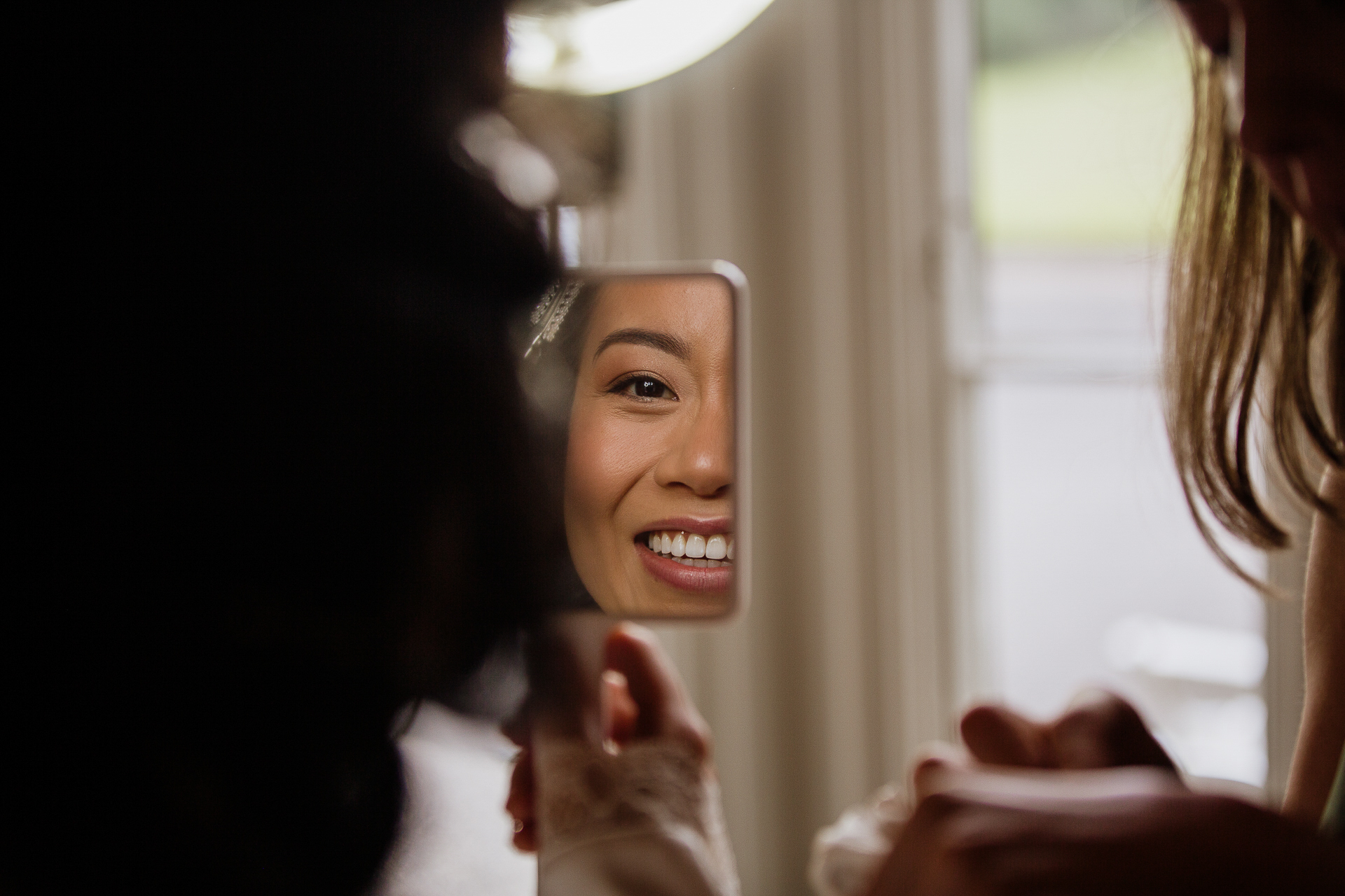 A person looking at a mirror