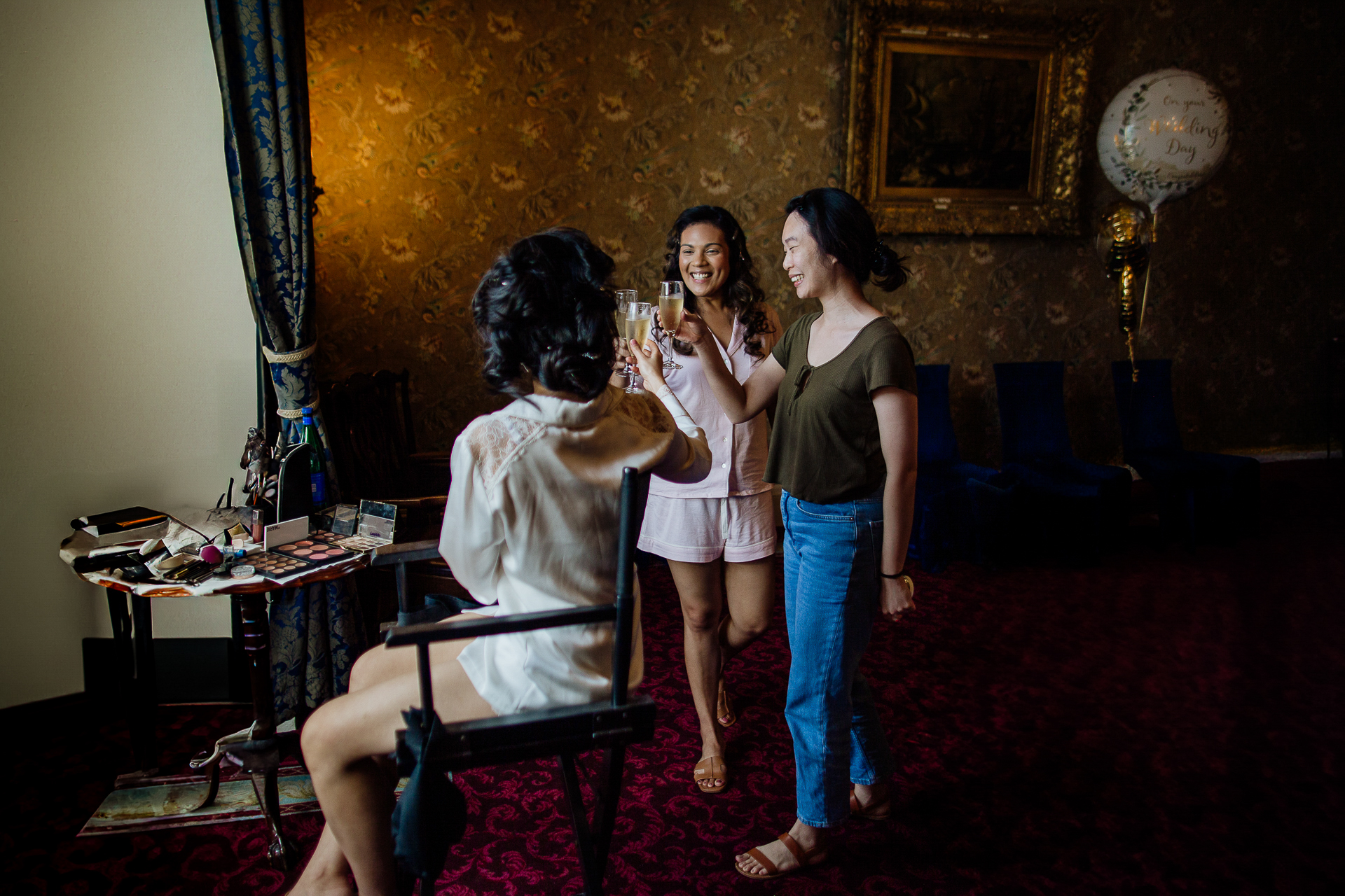 A group of women standing in a living room