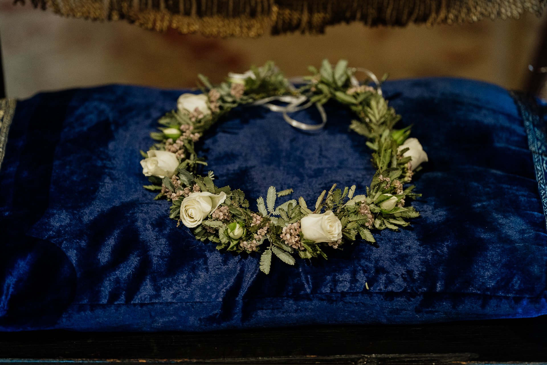 A bouquet of flowers on a blue cloth