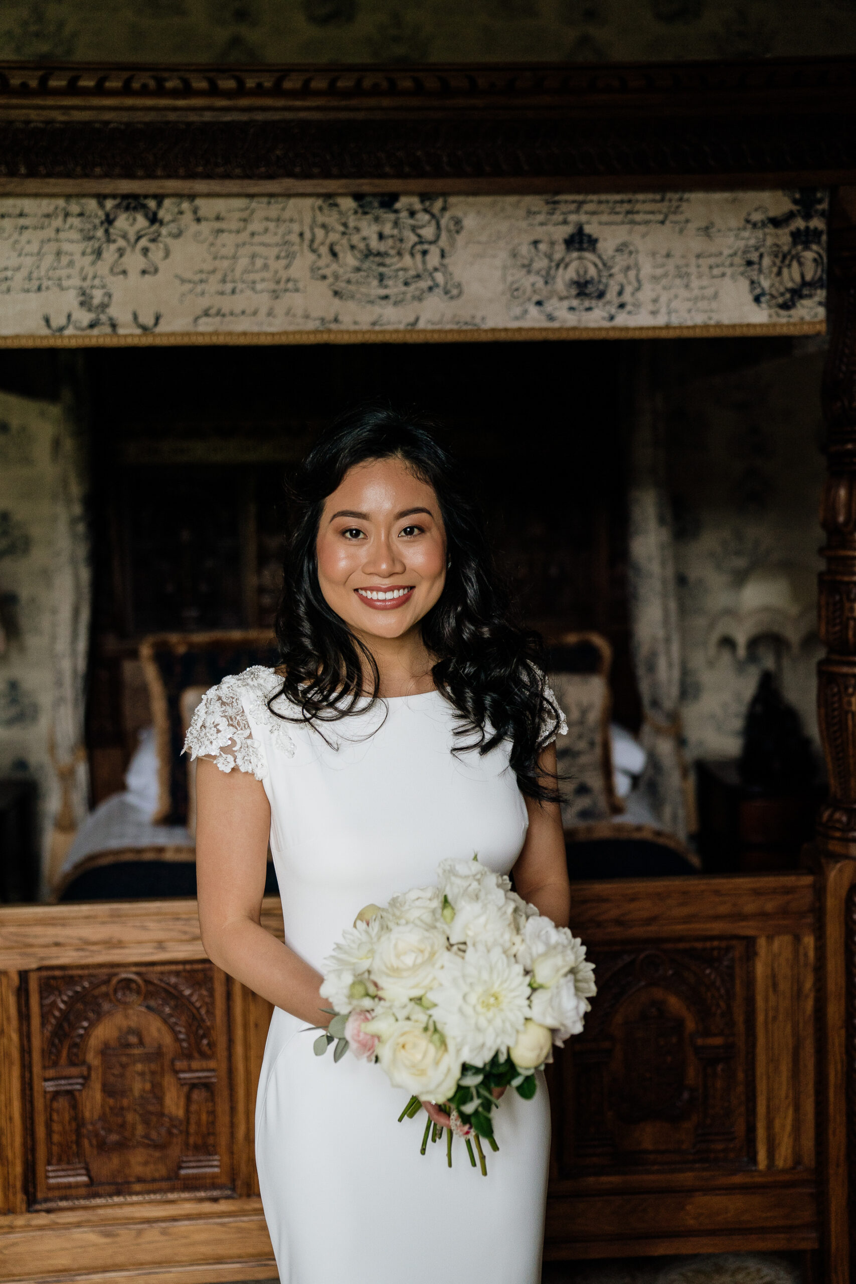 A woman holding a bouquet of flowers