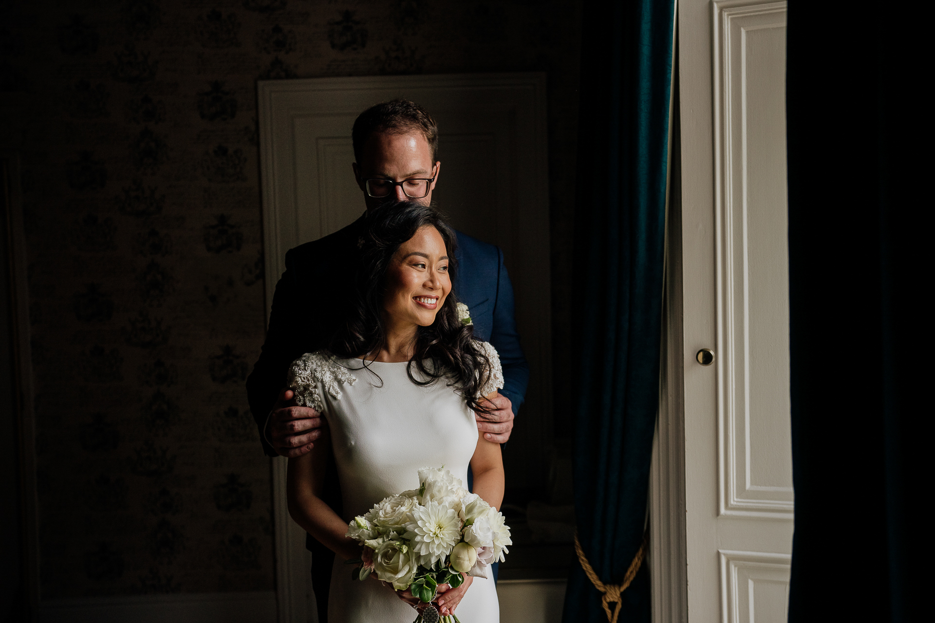 A man and woman posing for a picture