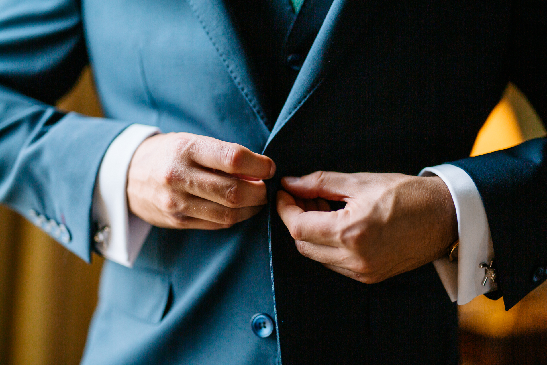 A close-up of a man and a woman shaking hands