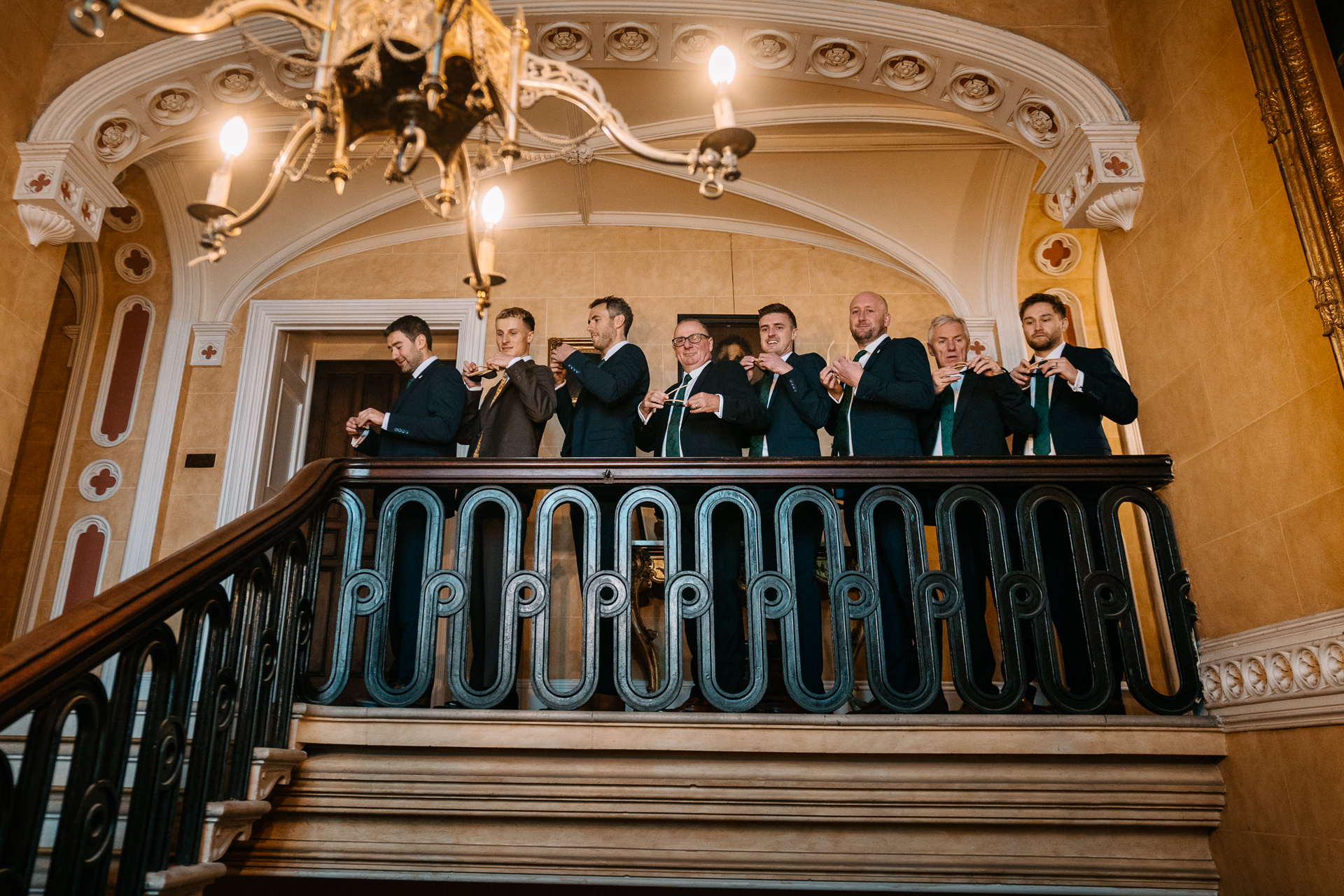 A group of people standing on a balcony