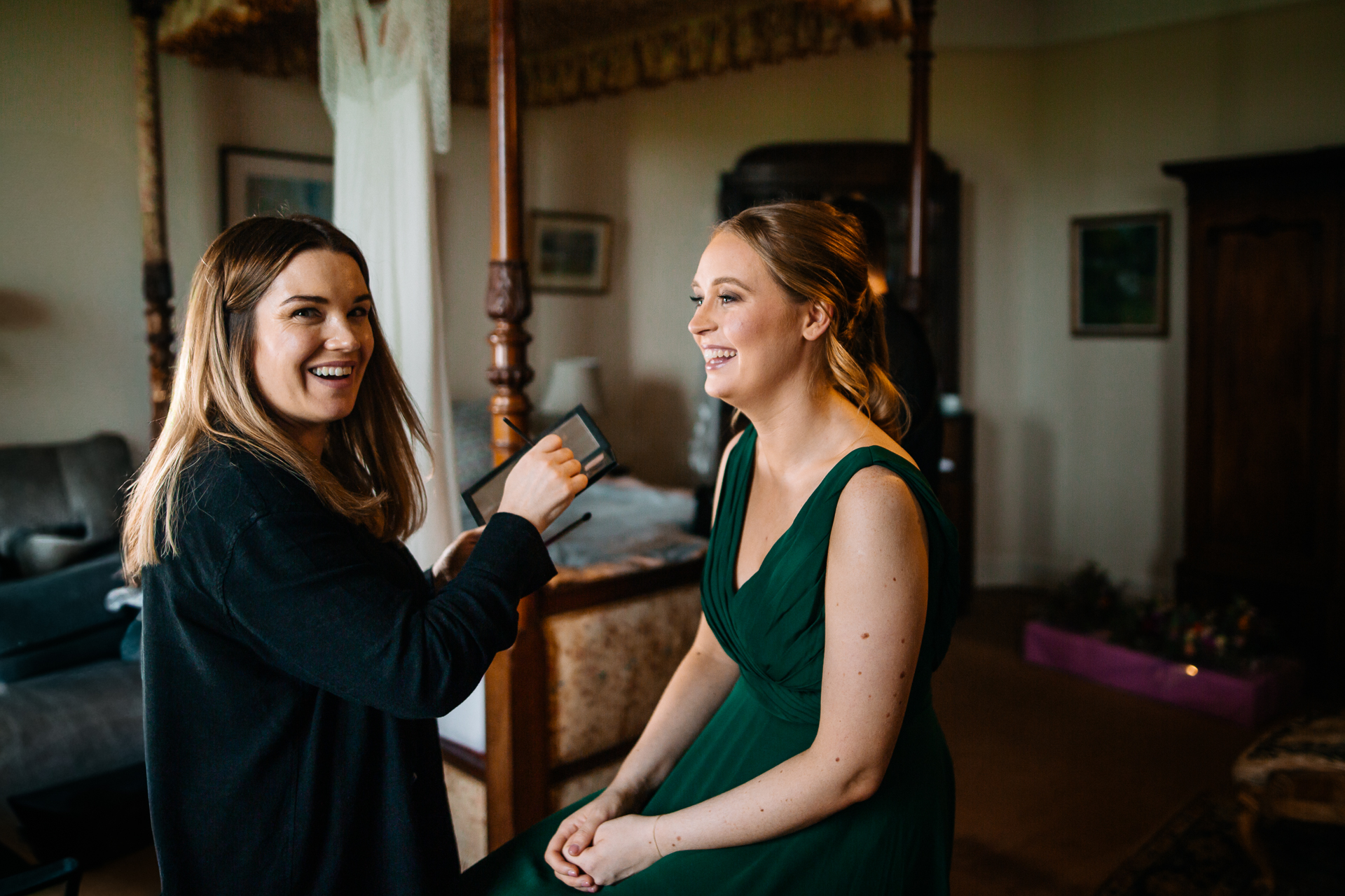 A couple of women smiling