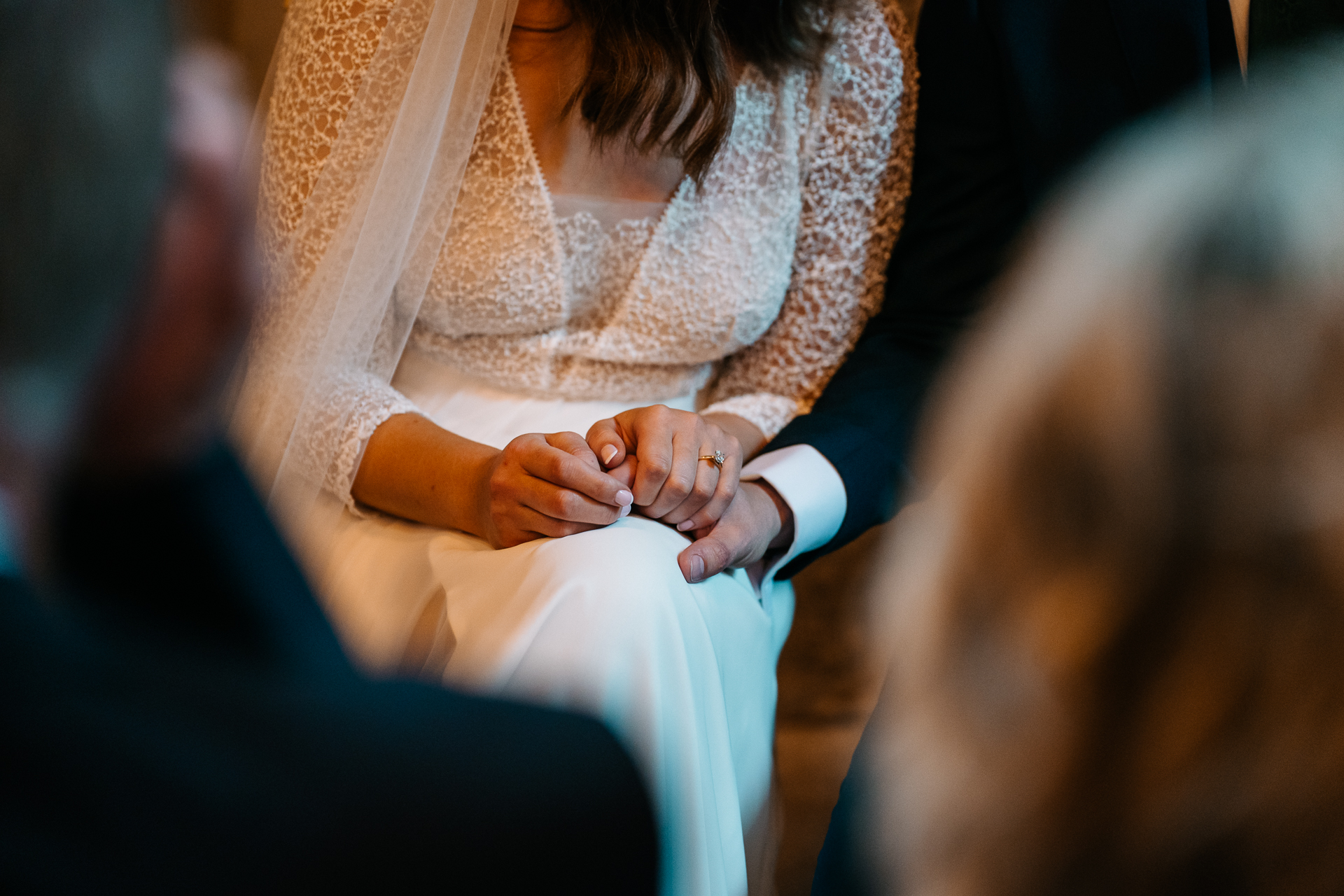 A person holding the hands together