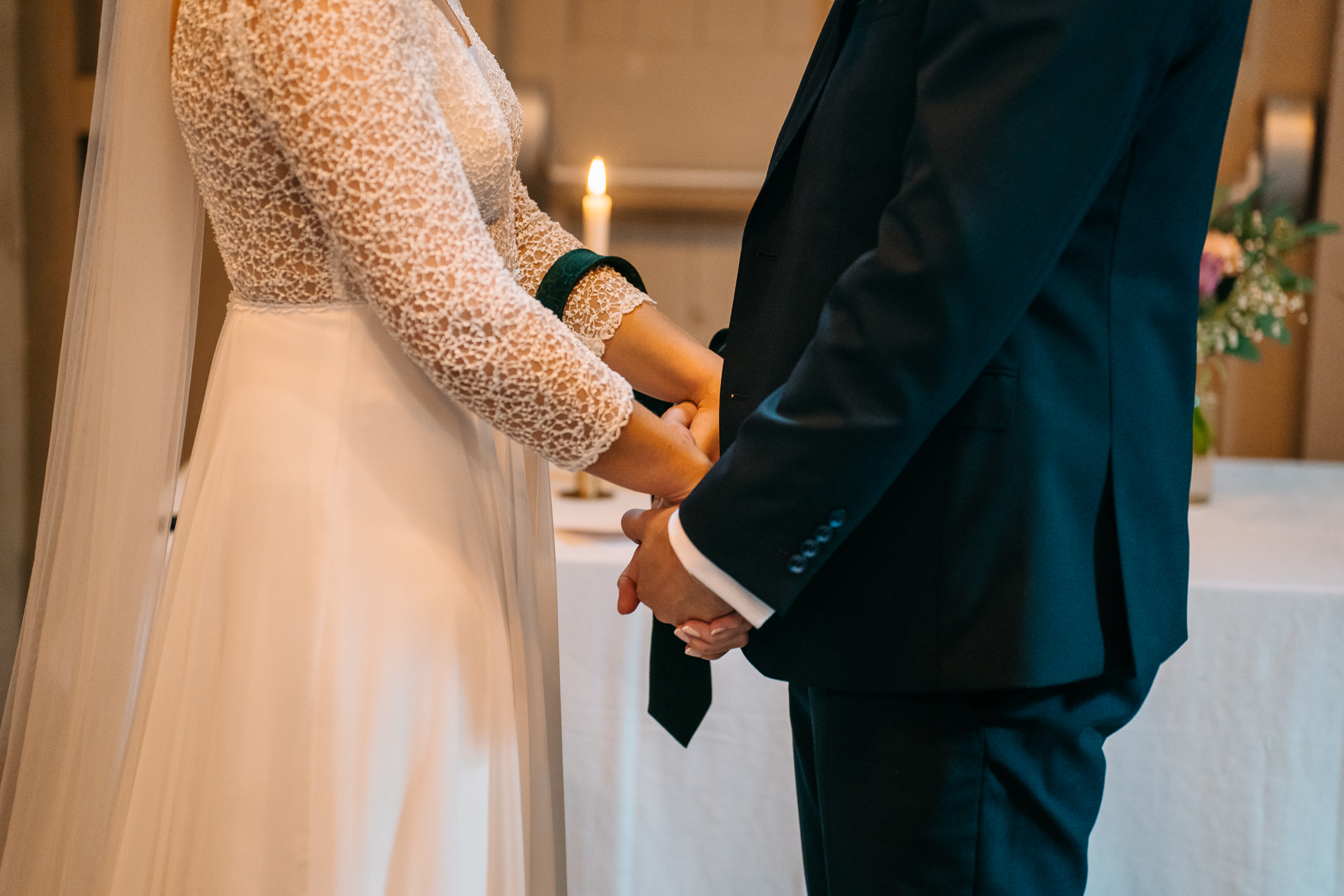 A man and woman holding hands