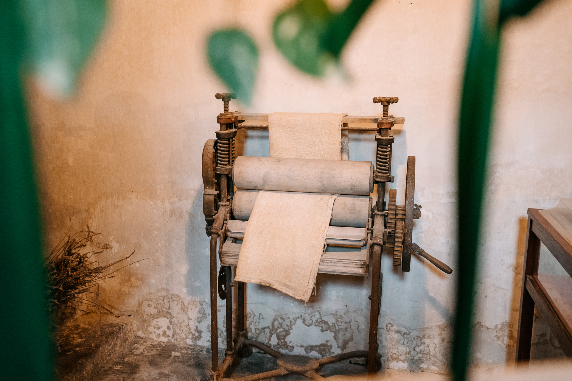 A wooden chair with a cloth on it