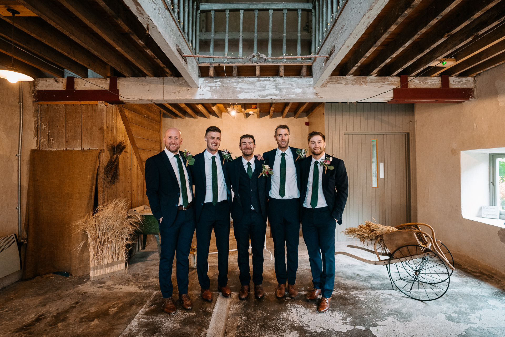 A group of men in suits standing in a room