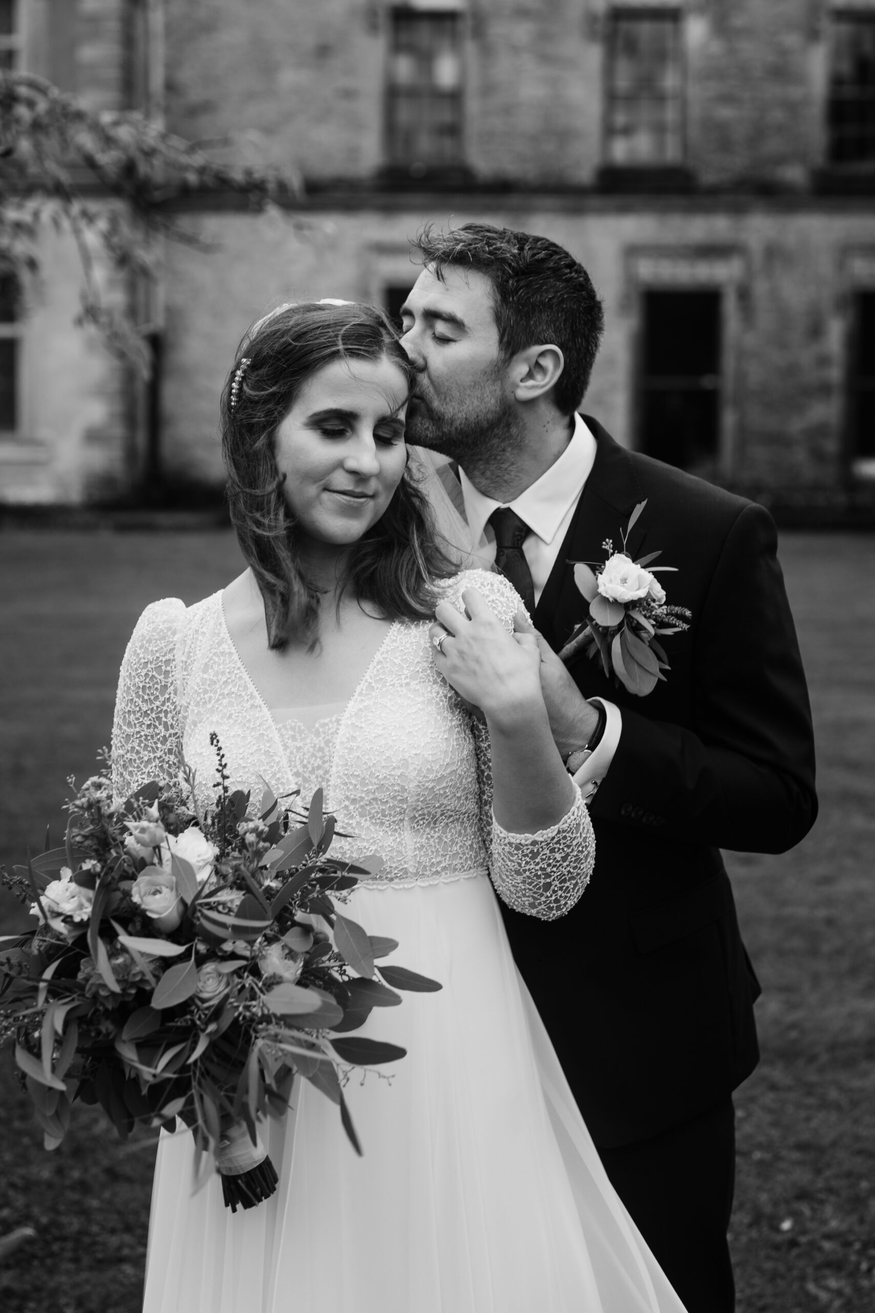 A man and woman posing for a picture