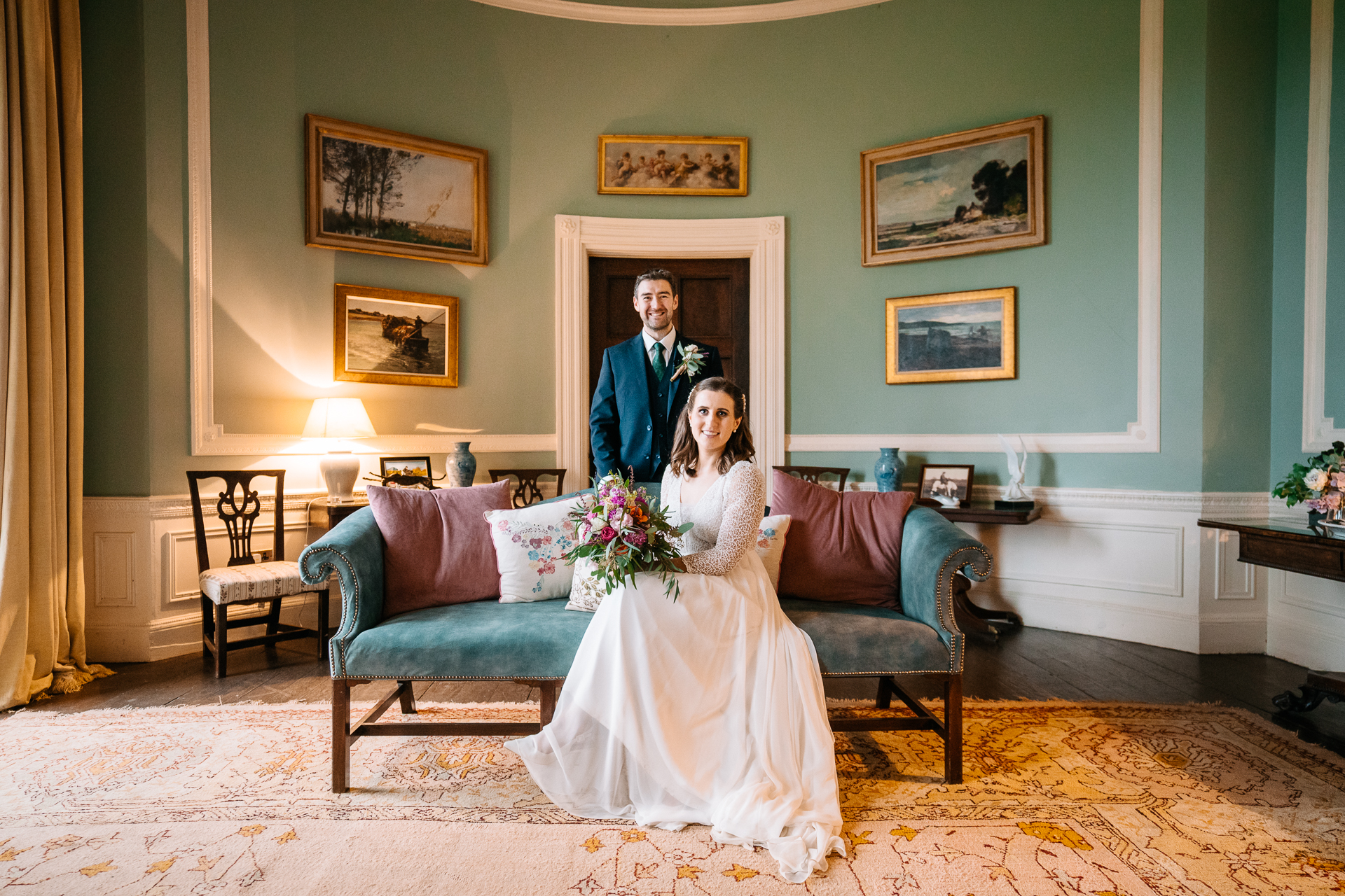 A bride and groom posing for a picture