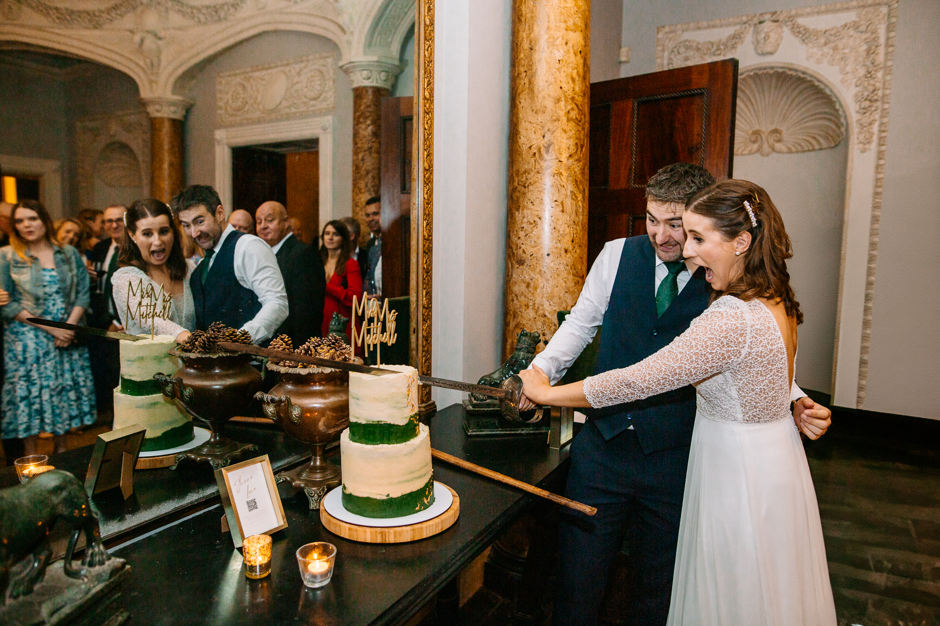 A bride and groom cutting a wedding cake