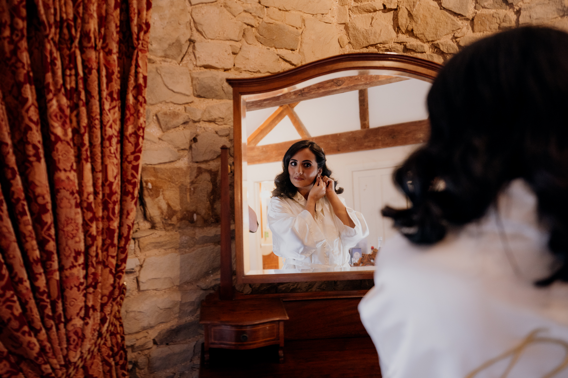 A person taking a picture of herself in a mirror