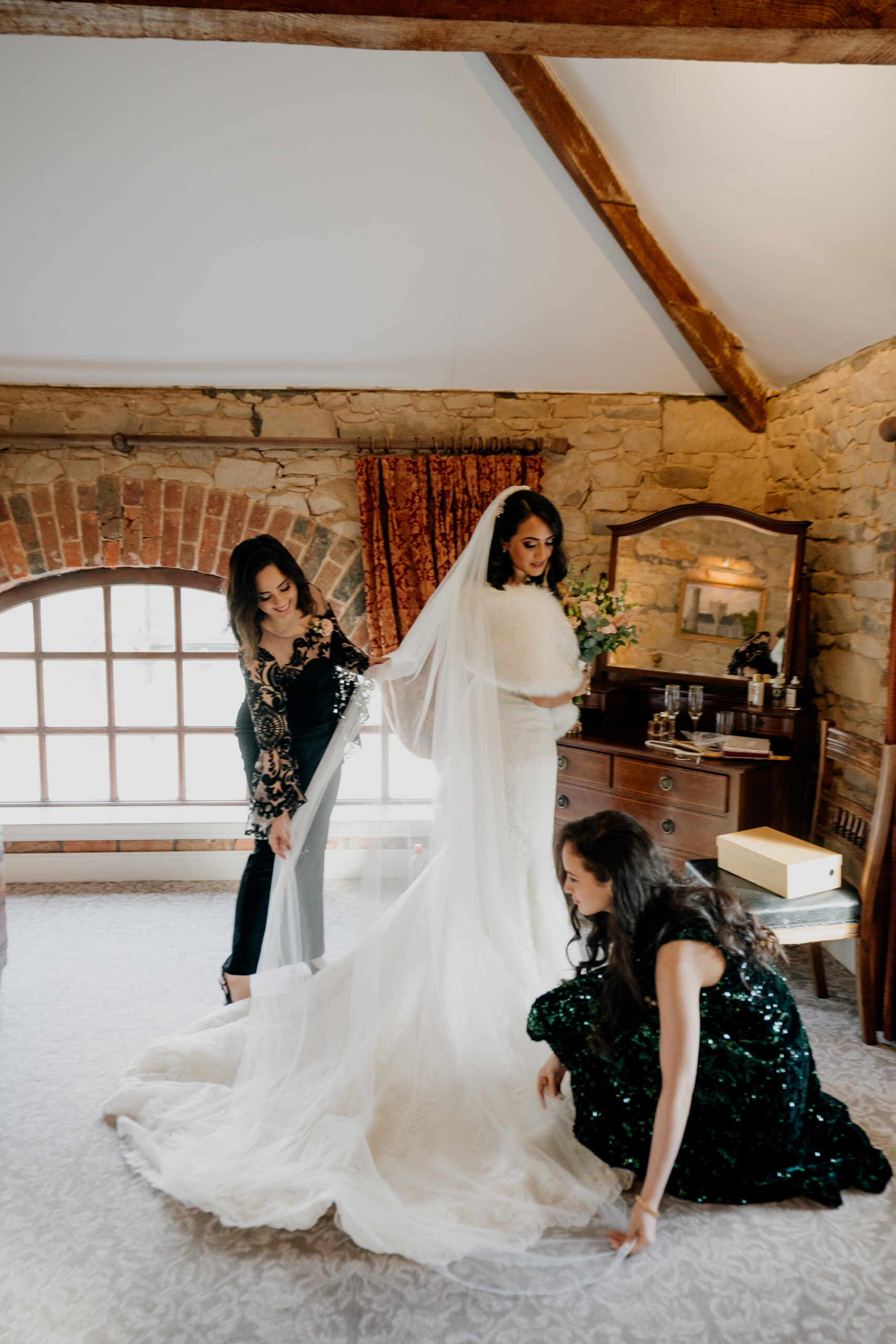 A bride and a groom in a room