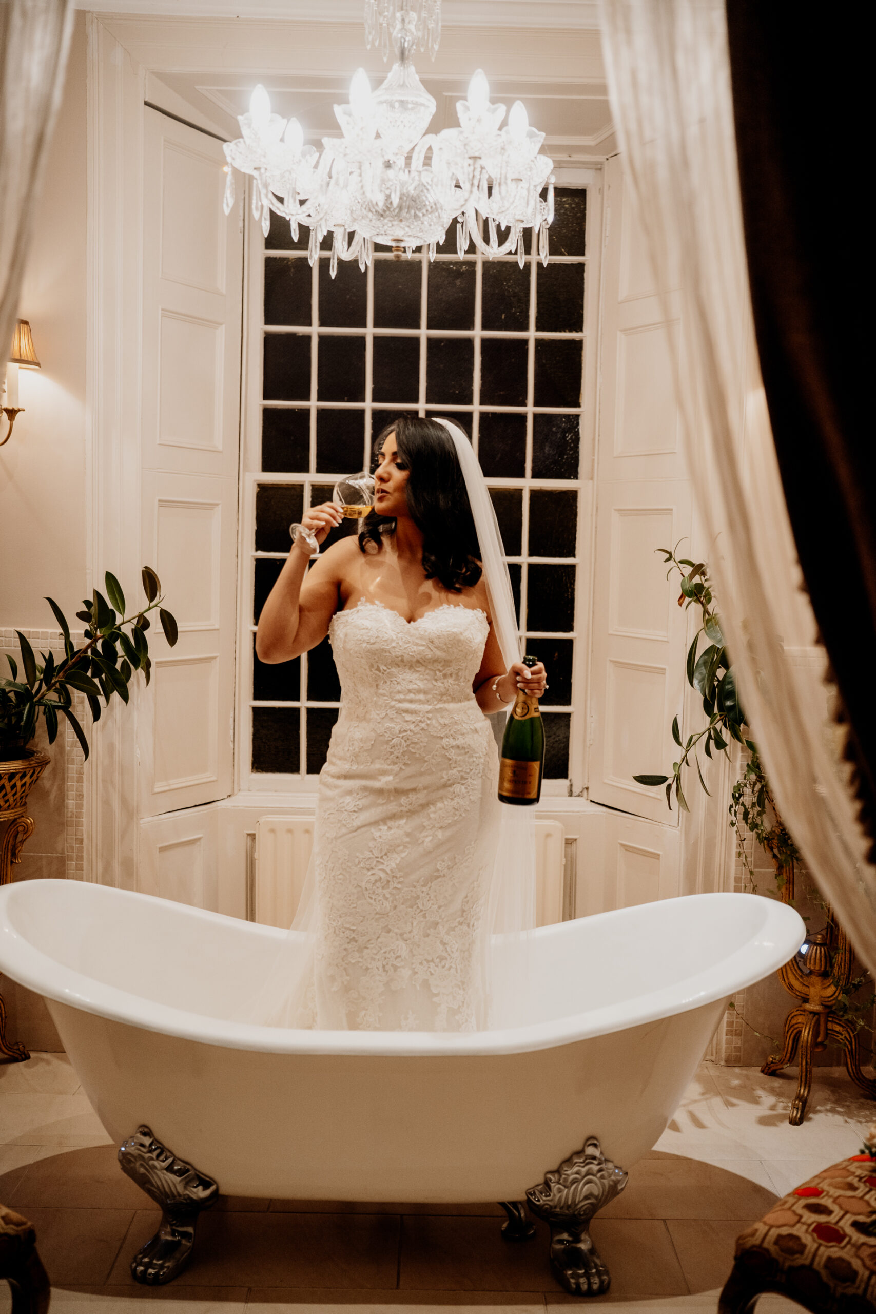 A person taking a picture of herself in a bathtub