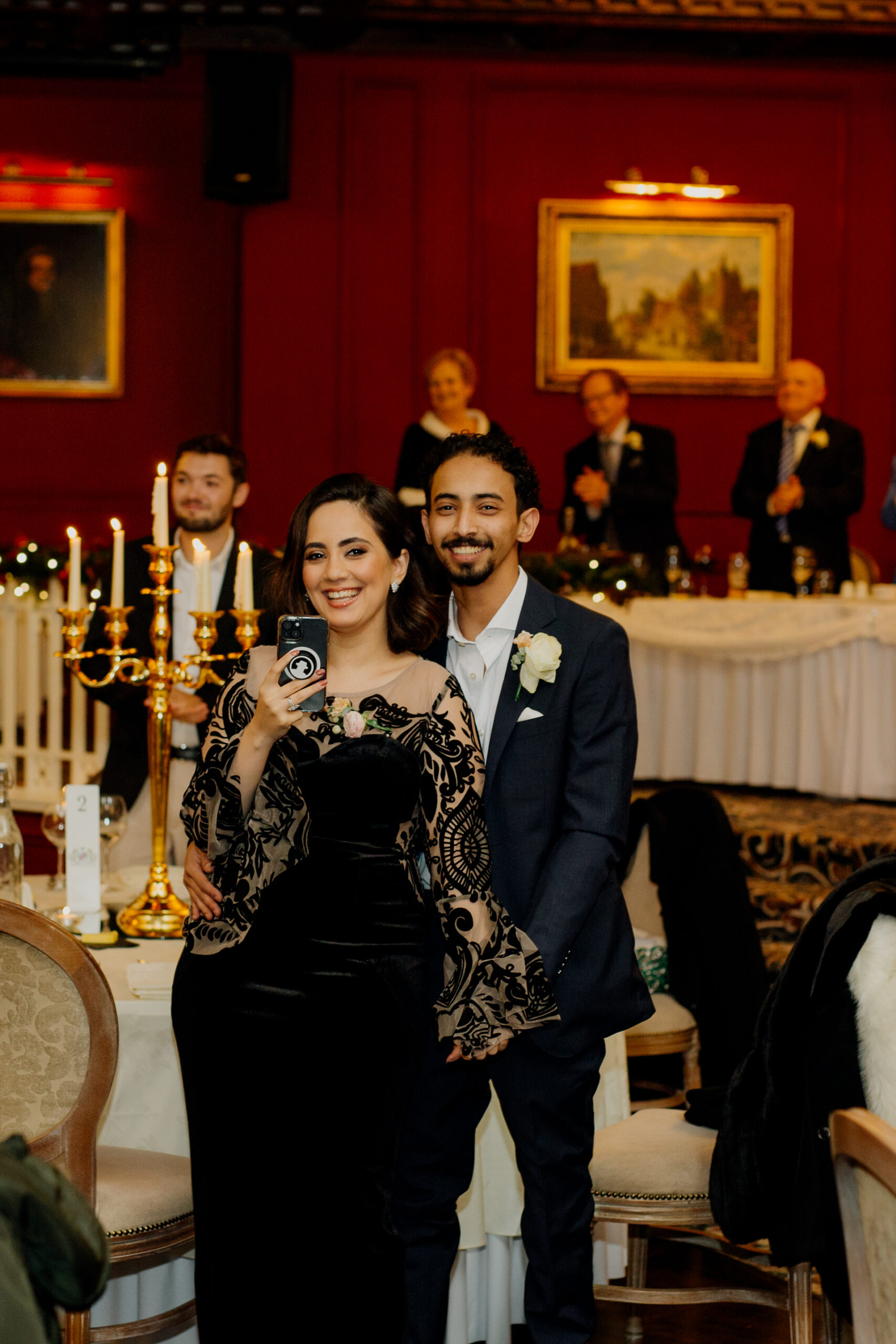 A man and woman posing for a picture