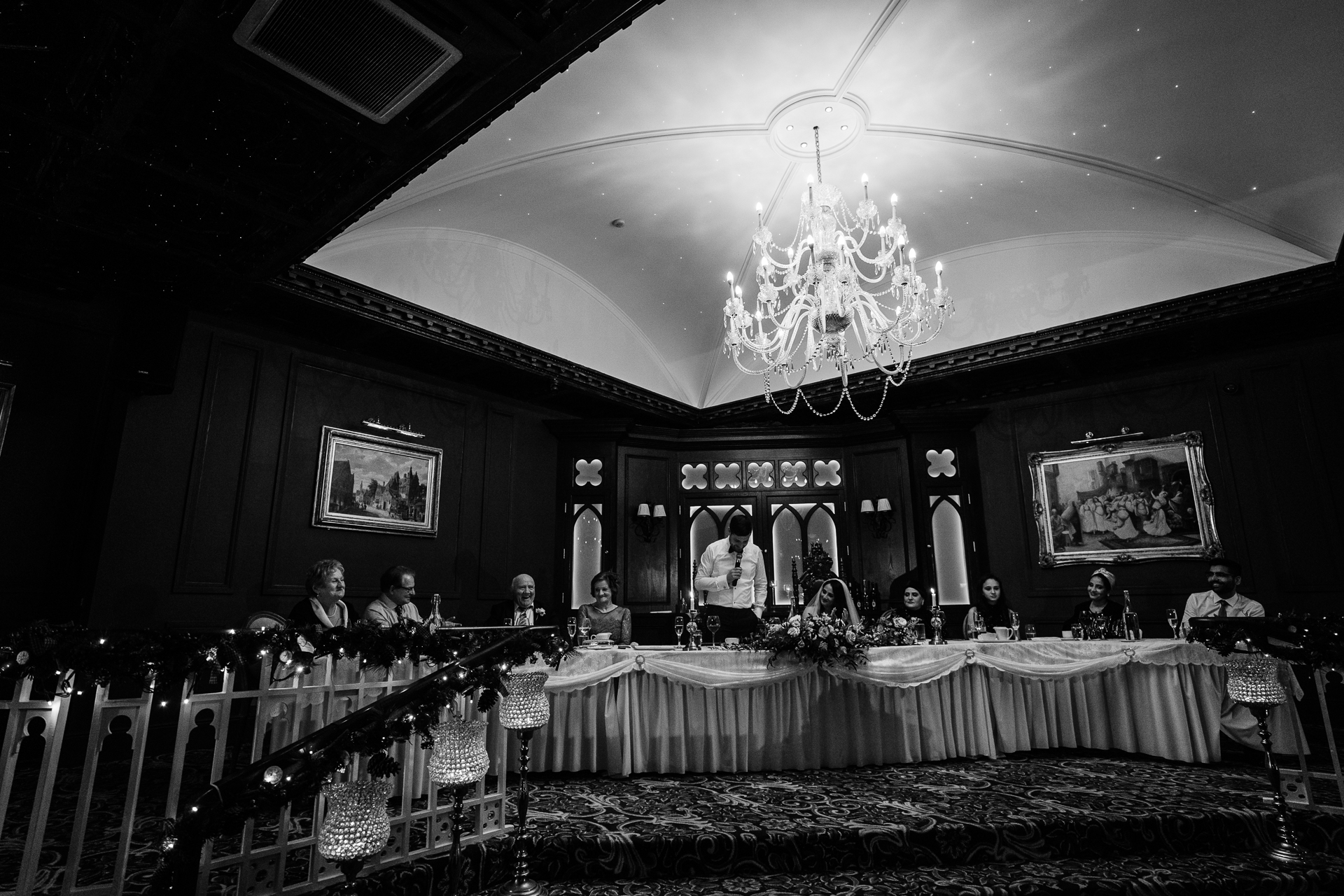 A group of people sitting at tables