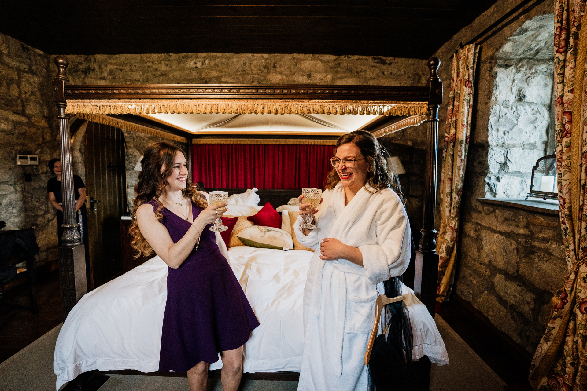 A couple of women in a bed