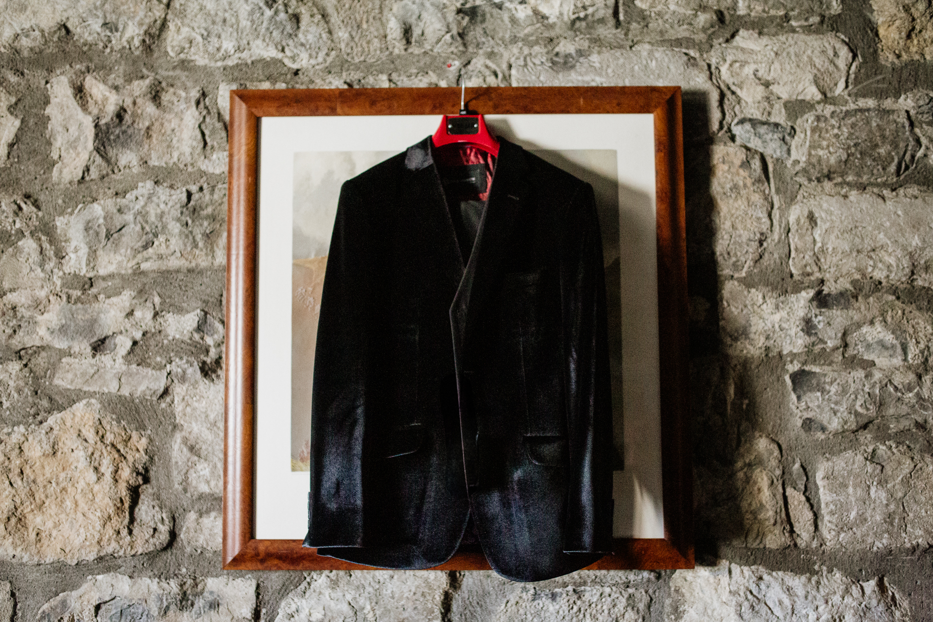 A black coat on a wall