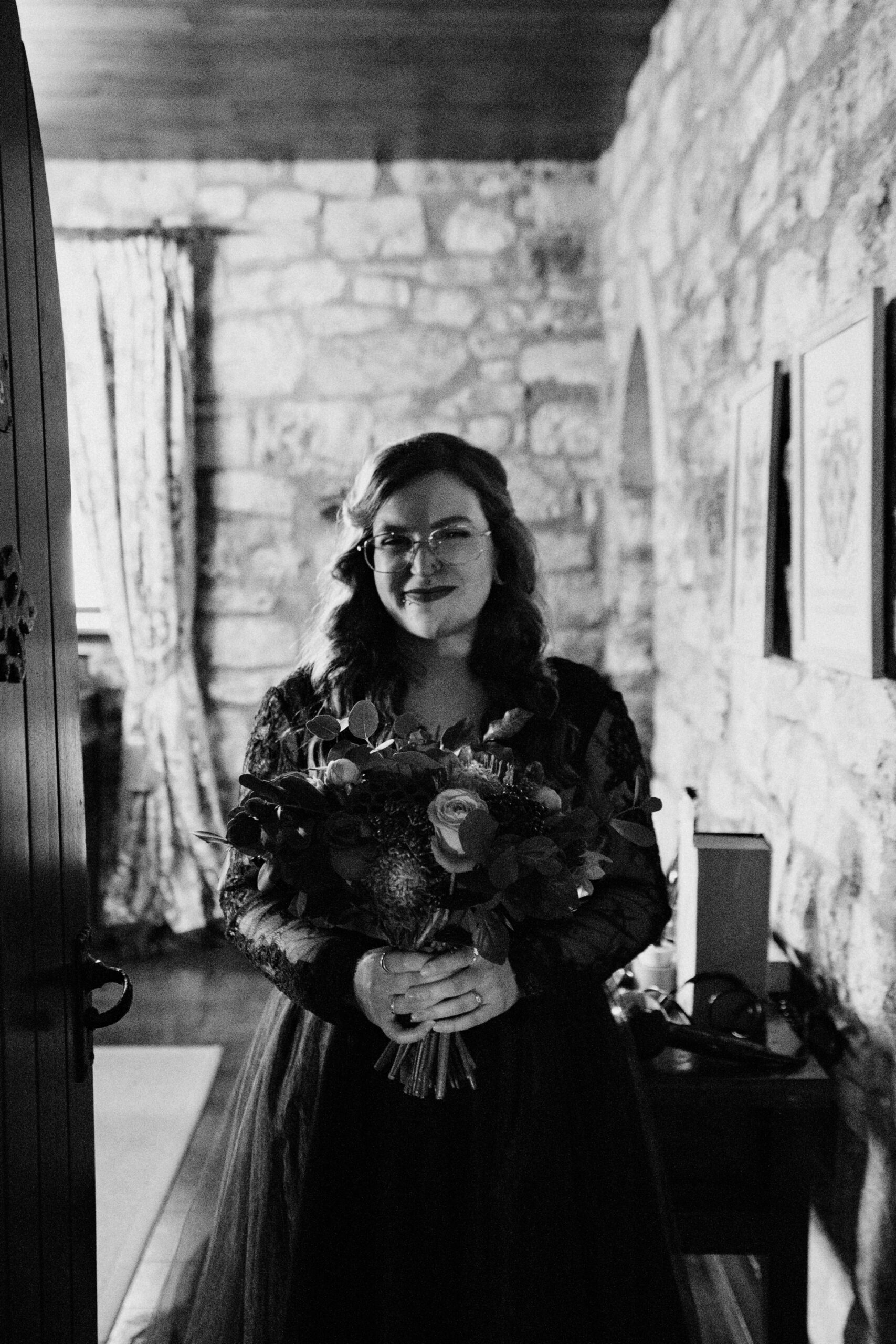 A woman holding a bouquet of flowers