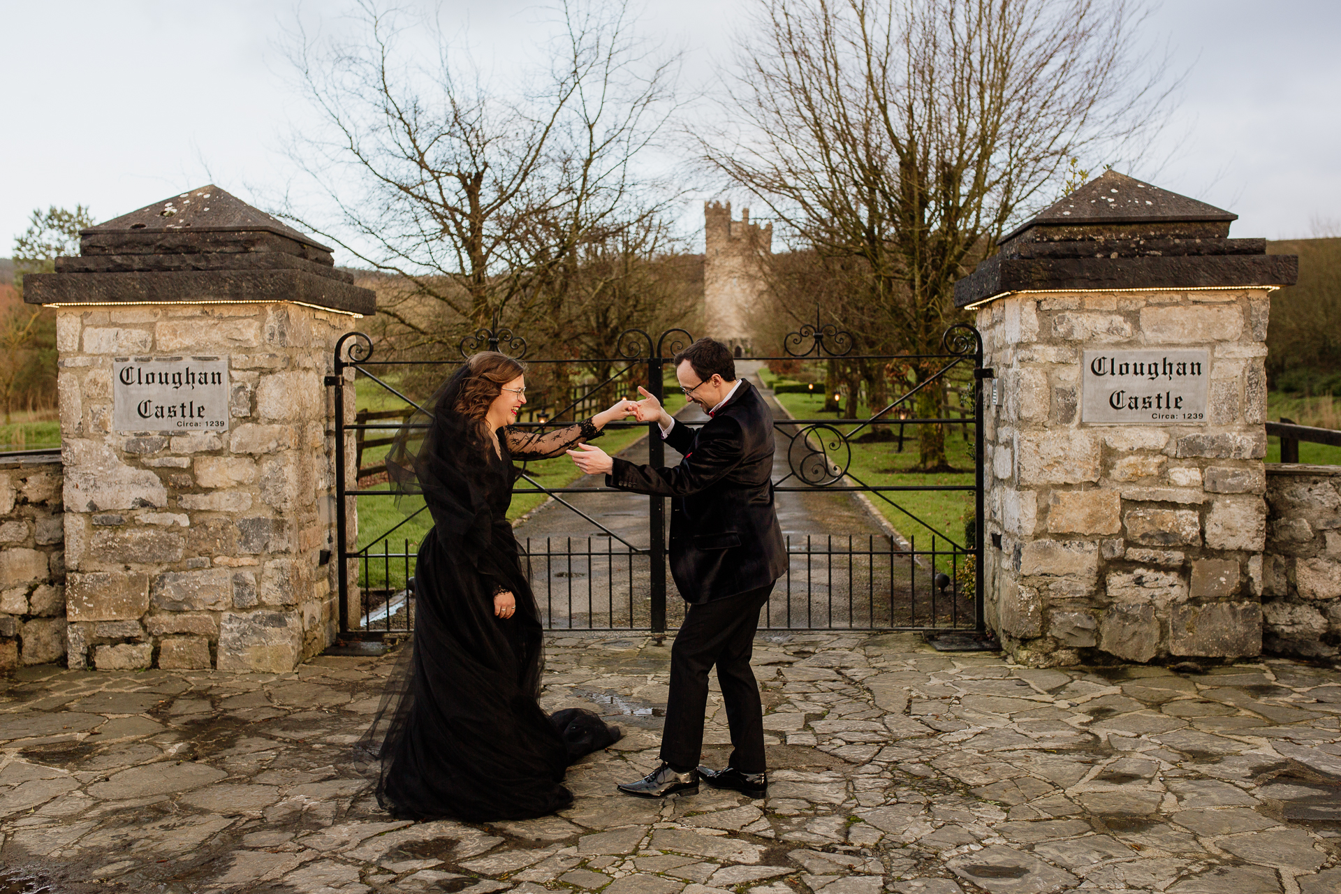 A man and woman in black dress