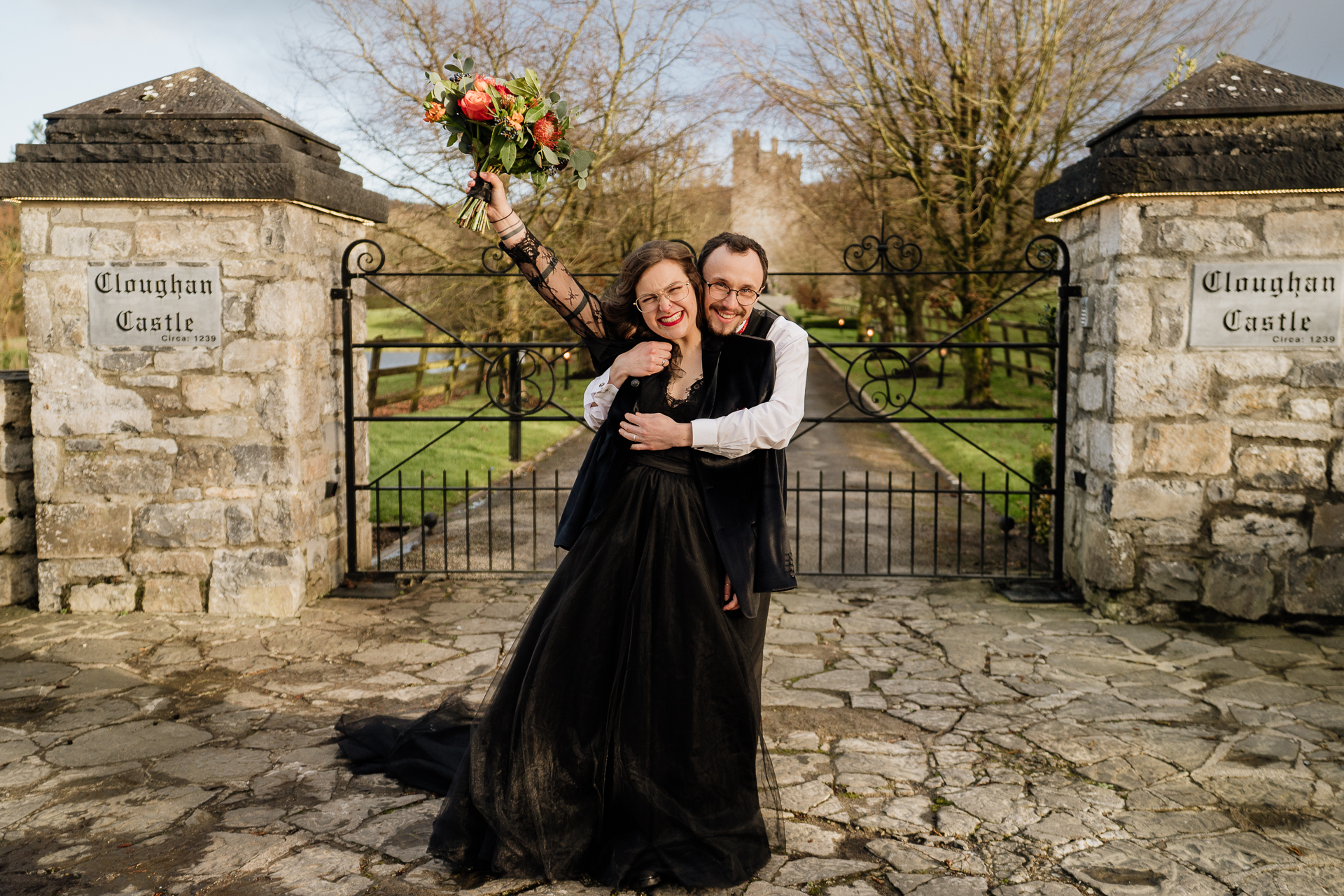 A man and woman posing for a picture