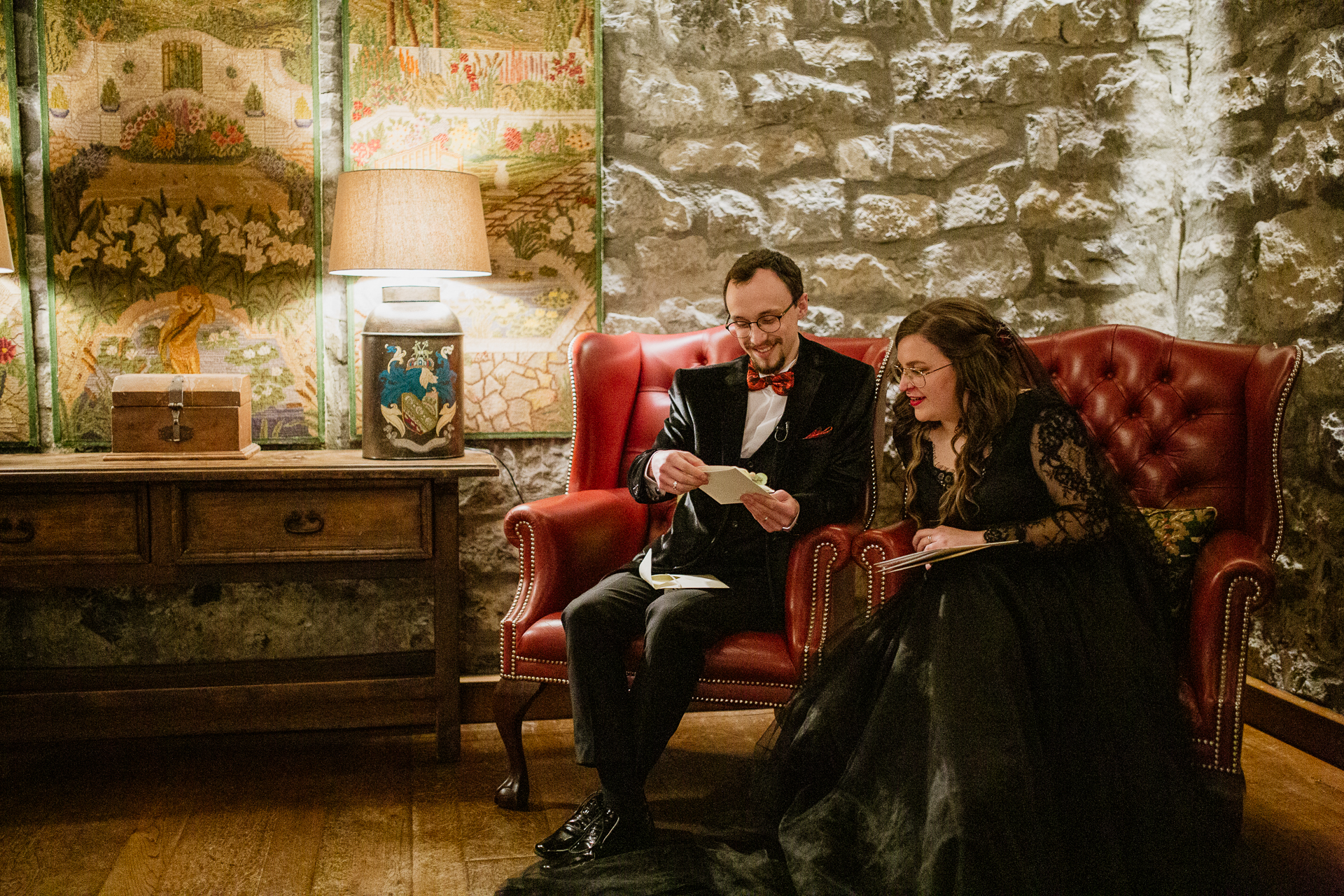 A man and woman sitting on a couch