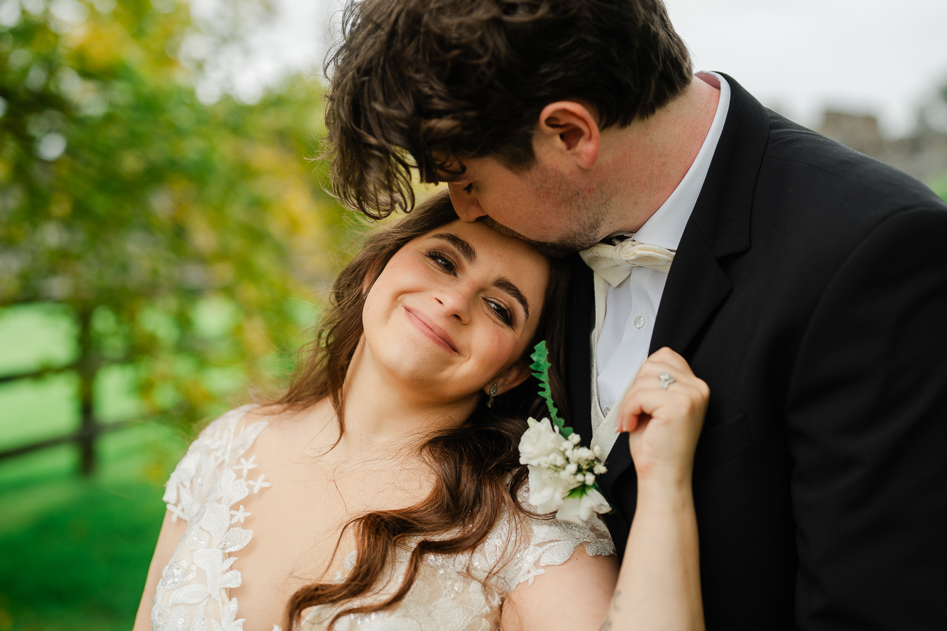 A man and woman posing for a picture